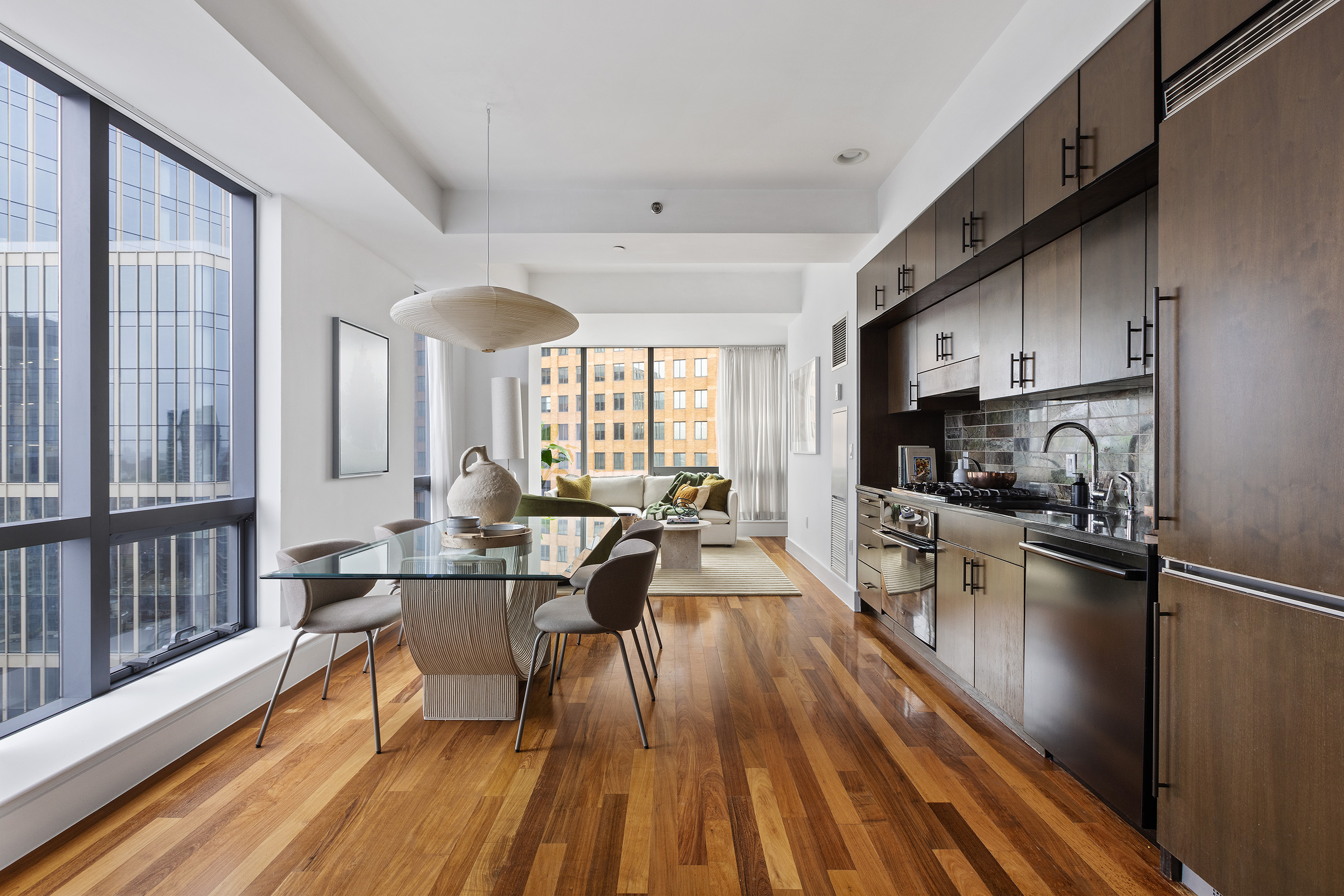 150 Myrtle Avenue, Unit 2506 Brooklyn, NY 11201 - Photo 2 of 16 a view of a dining room with furniture window and wooden floor