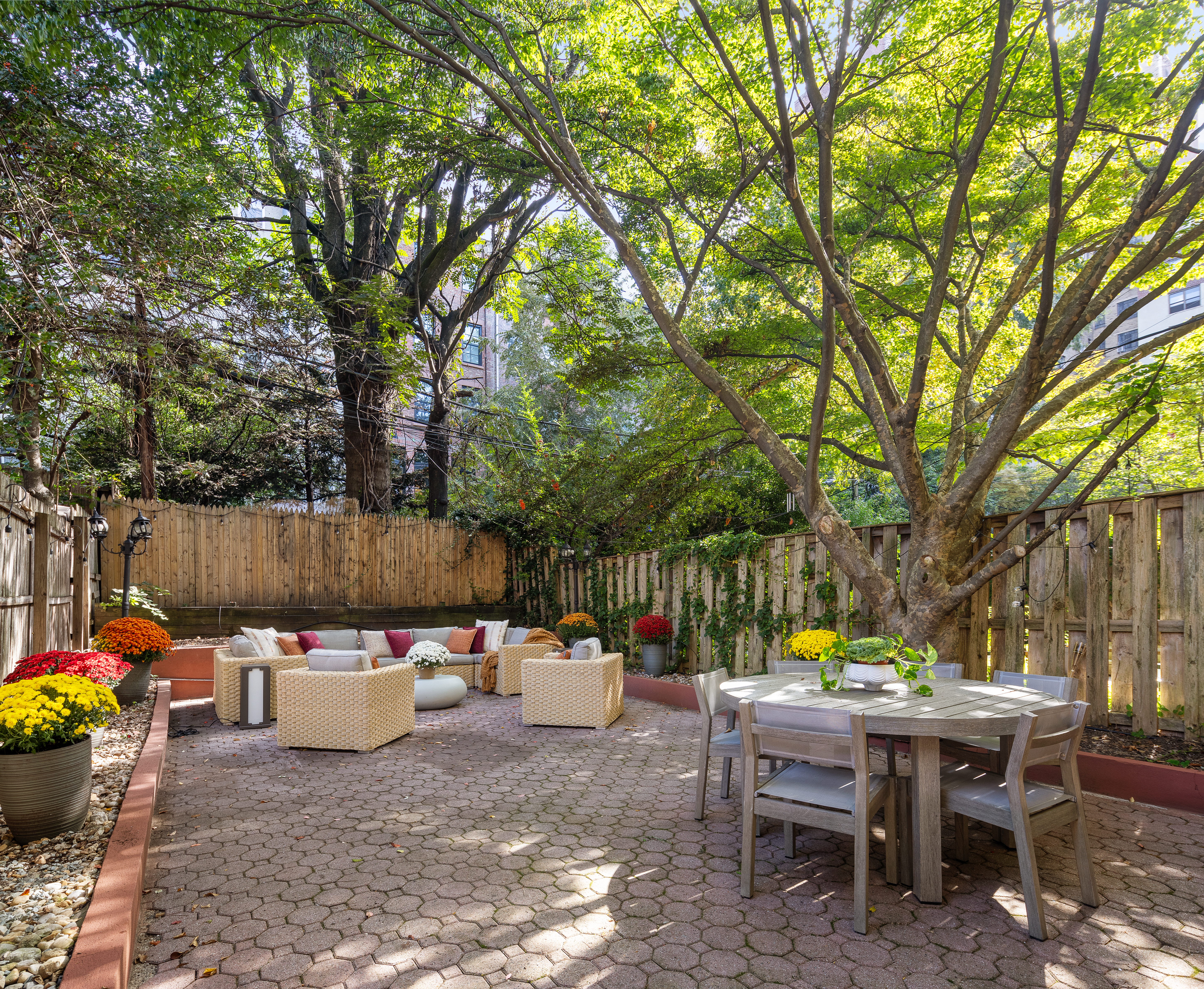 51 South Portland Avenue Brooklyn, NY 11217 - Photo 14 of 18 a view of a patio with a table and chairs and couches