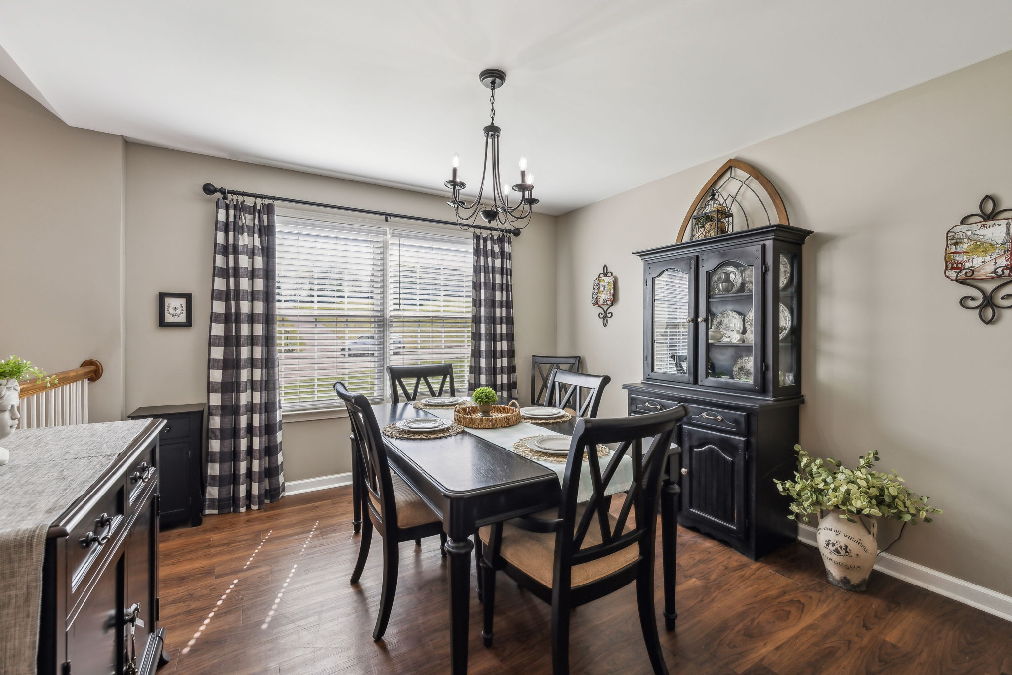 405 Billy Lane Spring Hill, TN 37174 - Photo 8 of 39 a view of a dining room with furniture window and wooden floor