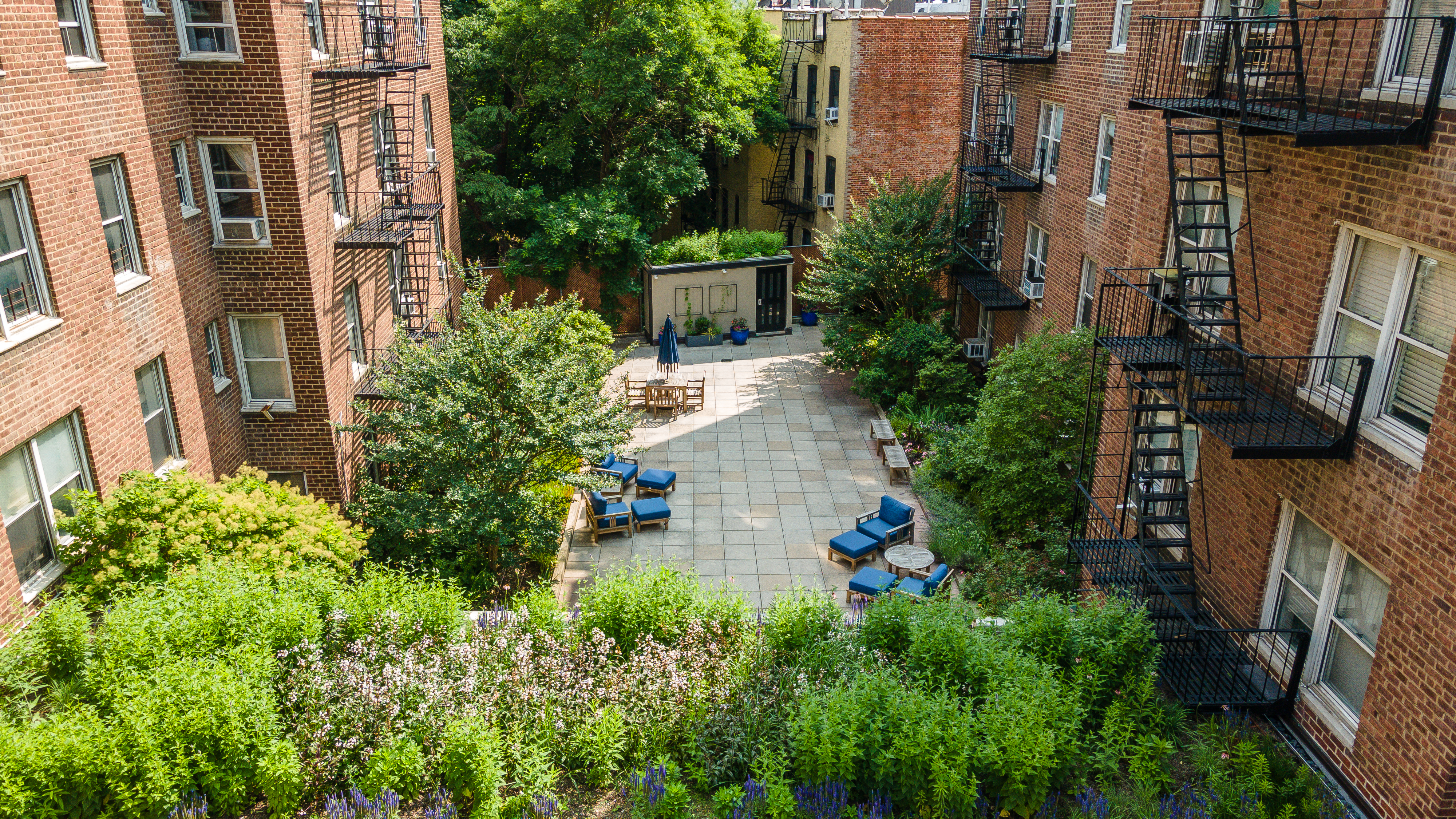 340 Haven Avenue, Unit 2H Manhattan, NY 10033 - Photo 15 of 24 a view of a pathway both side of the building