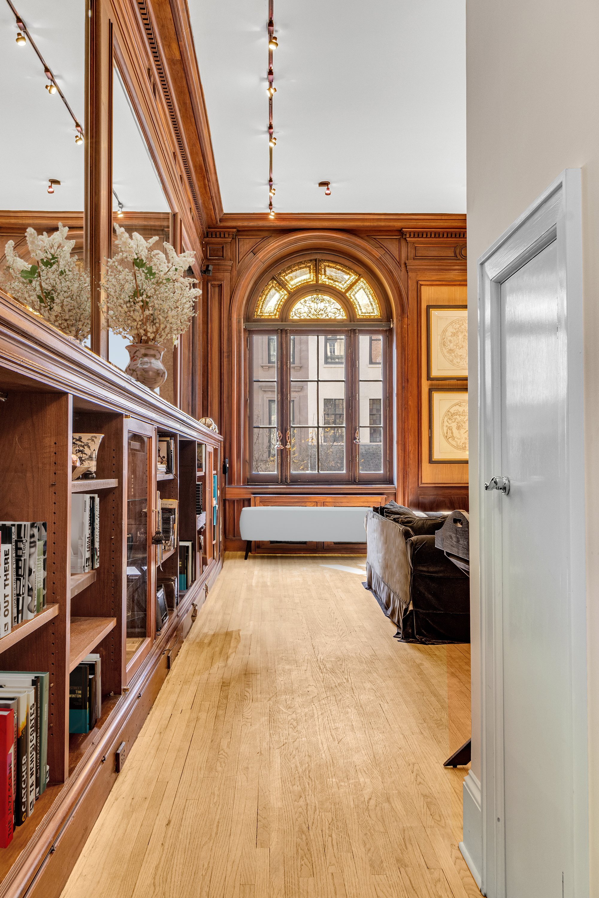 35 East 68th Street, Unit 2A Manhattan, NY 10021 - Photo 5 of 19 a view of front door with hallway and a large window