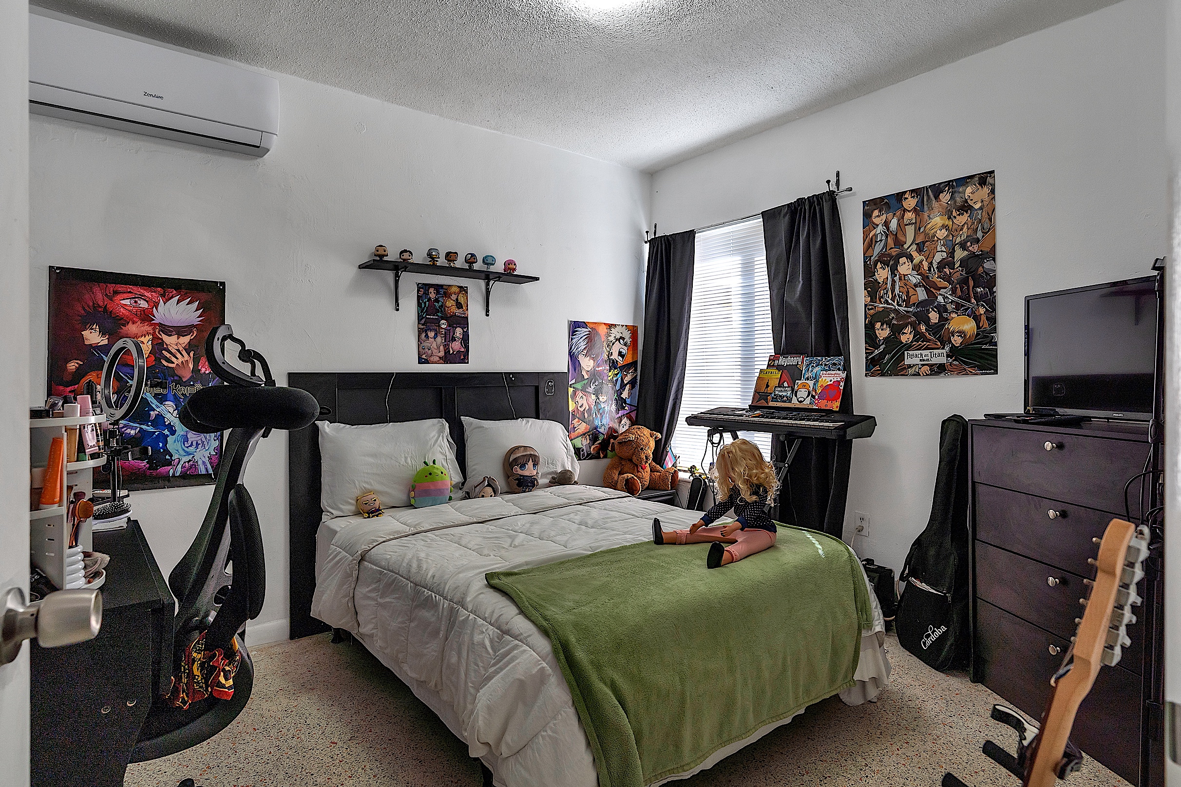 1361 Southwest 4th Street Miami, FL 33135 - Photo 12 of 23 a bedroom with bed a flat tv screen and dresser