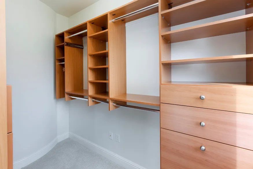 a view of an empty walk in closet