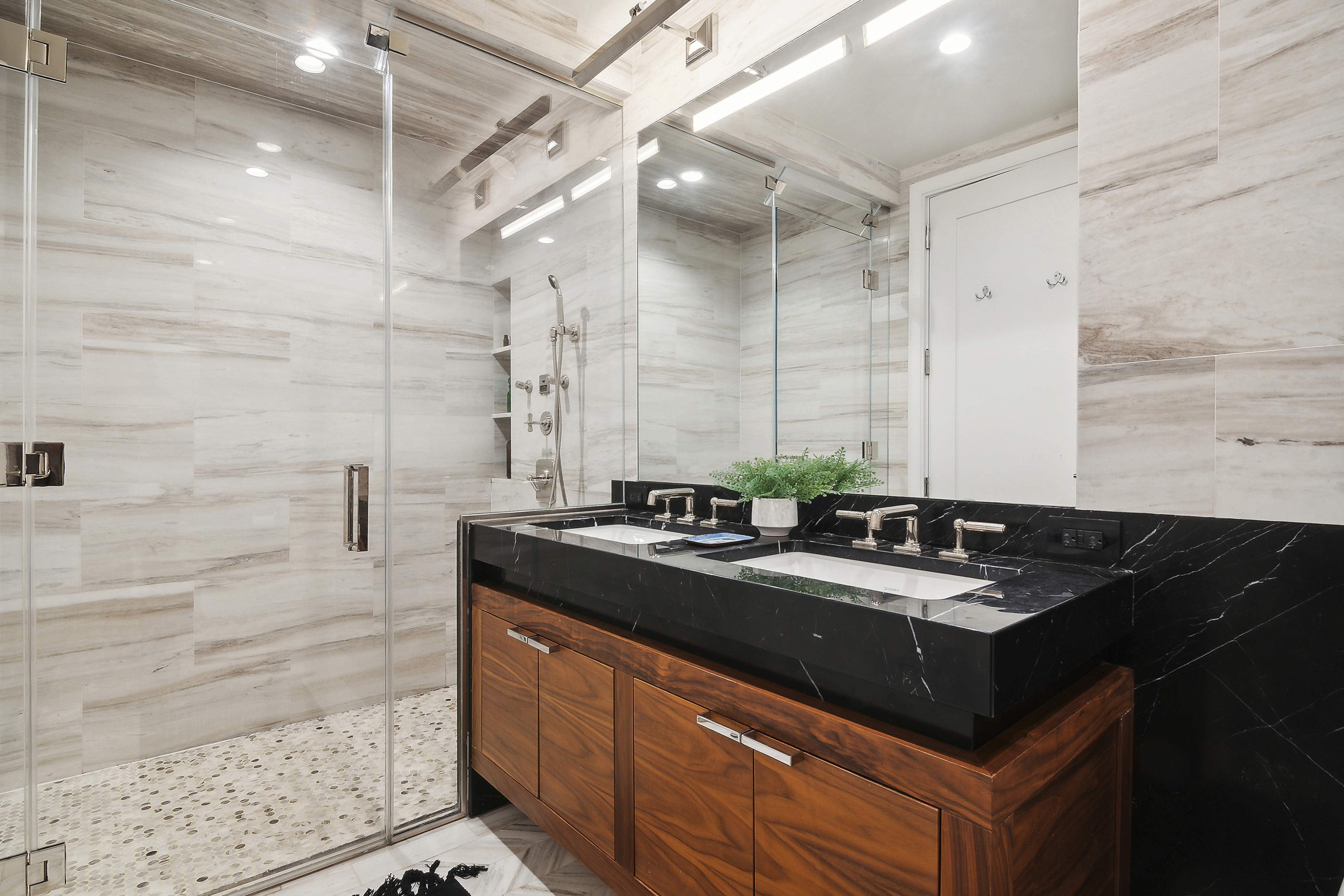 613 Baltic Street, Unit 2C Brooklyn, NY 11217 - Photo 6 of 16 a bathroom with double sink and a mirror
