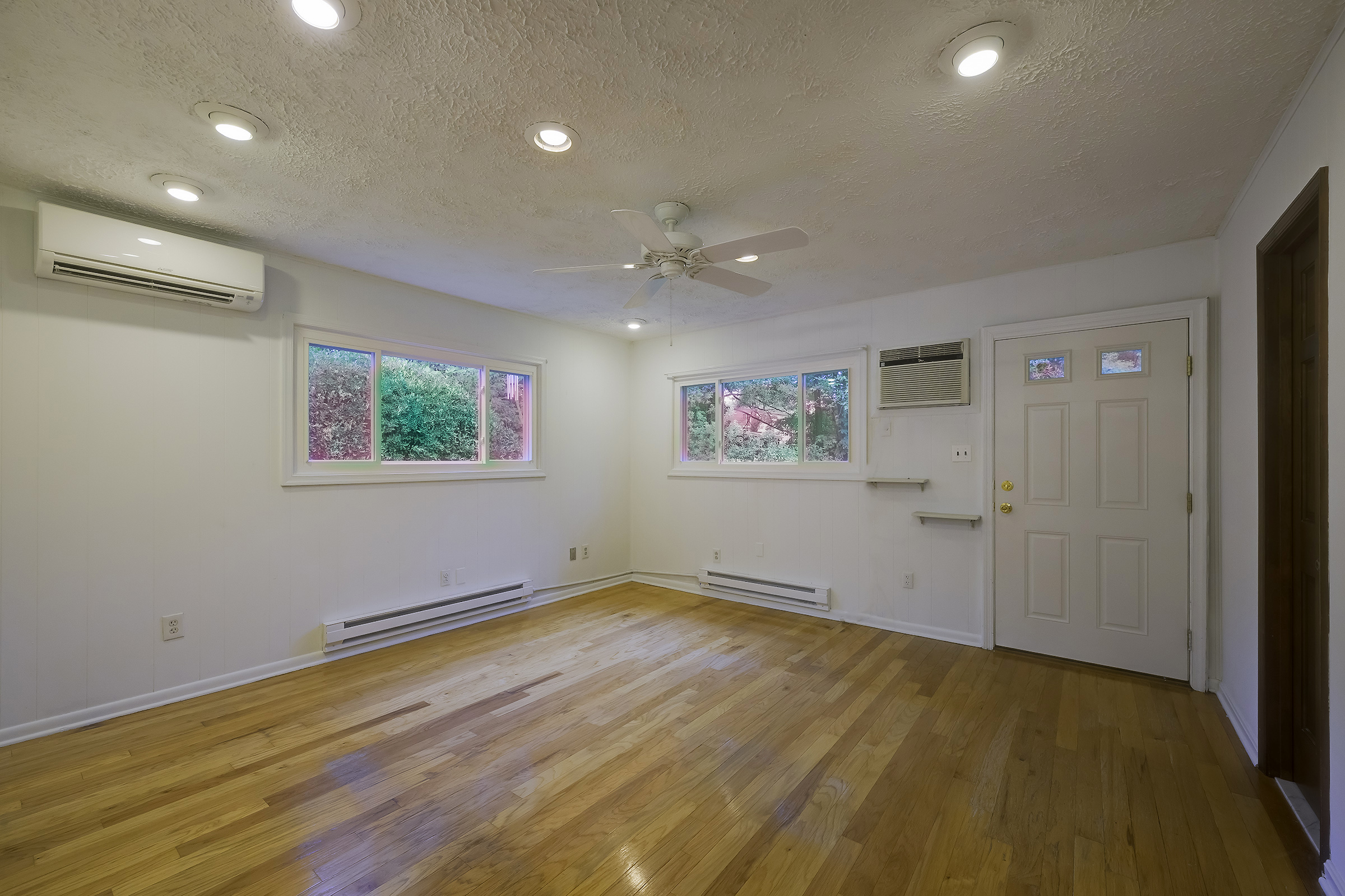 45 D Ridge Road Greenbelt, MD 20770 - Photo 21 of 35 a view of room with wooden floor and window