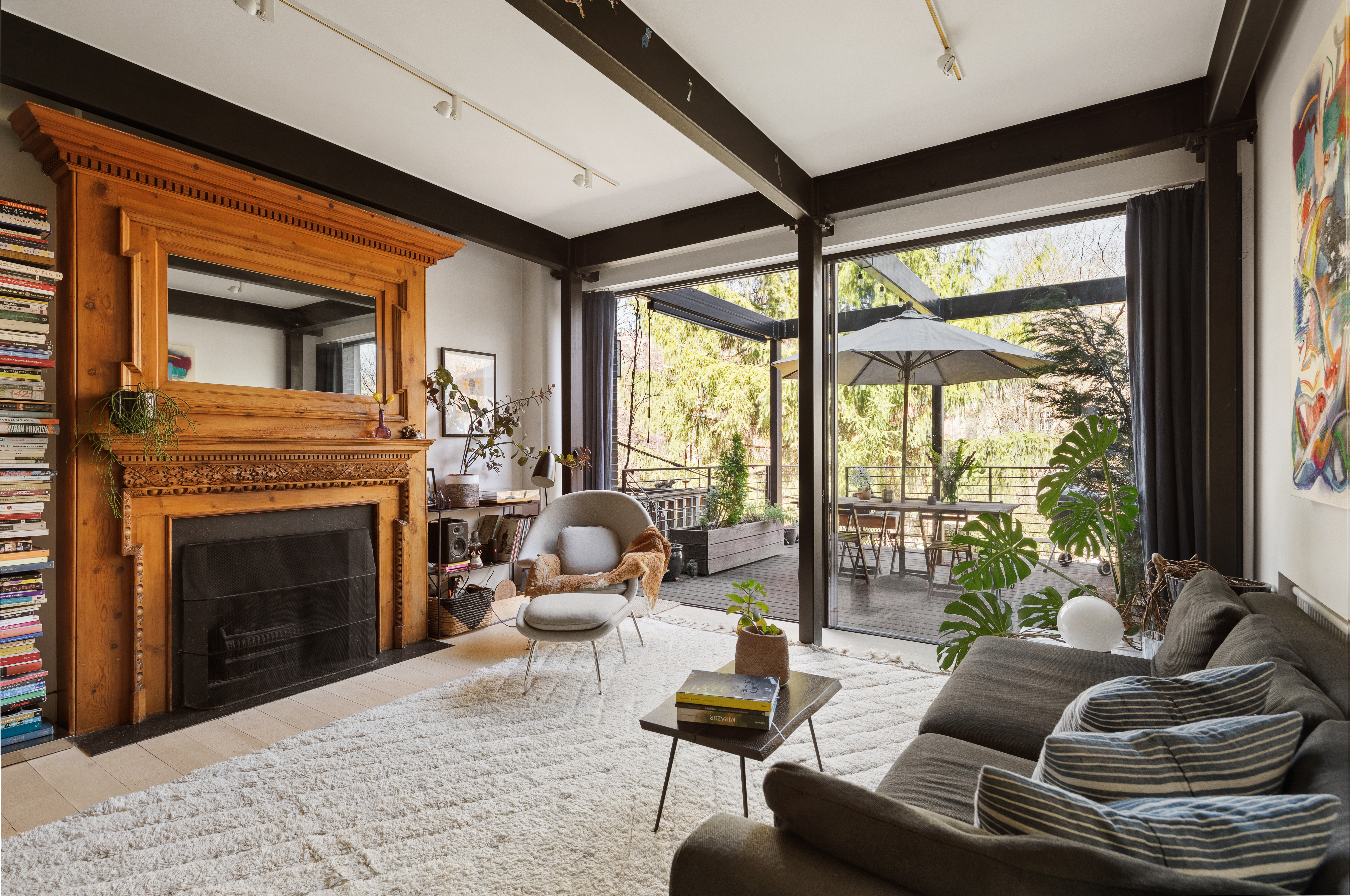 171 Garfield Place Brooklyn, NY 11215 - Photo 1 of 19 a living room with furniture and a fireplace