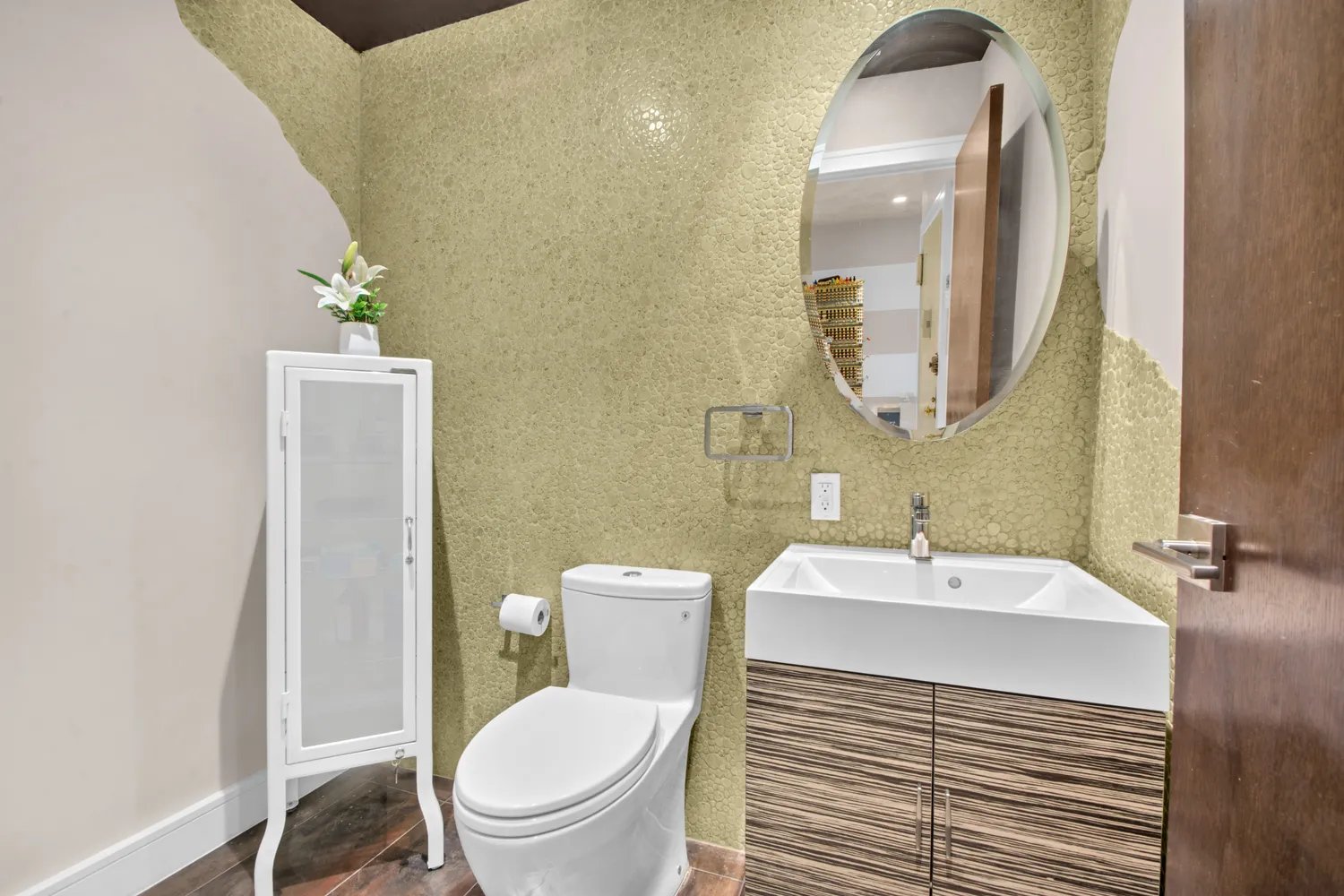 a view of a table and chairs under an umbrella