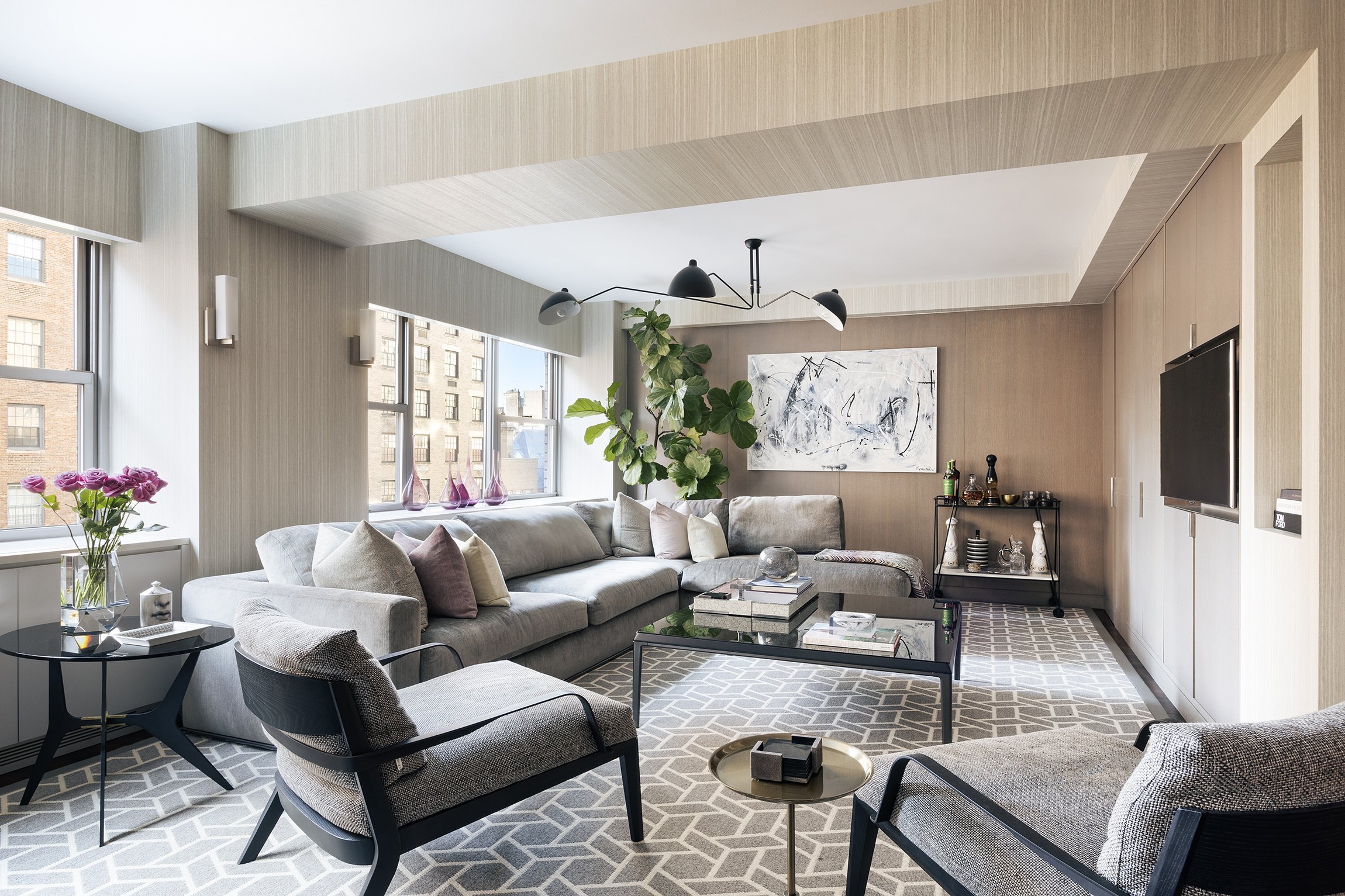 45 East 72nd Street, Unit 9C Manhattan, NY 10021 - Photo 2 of 16 a living room with furniture and a large window