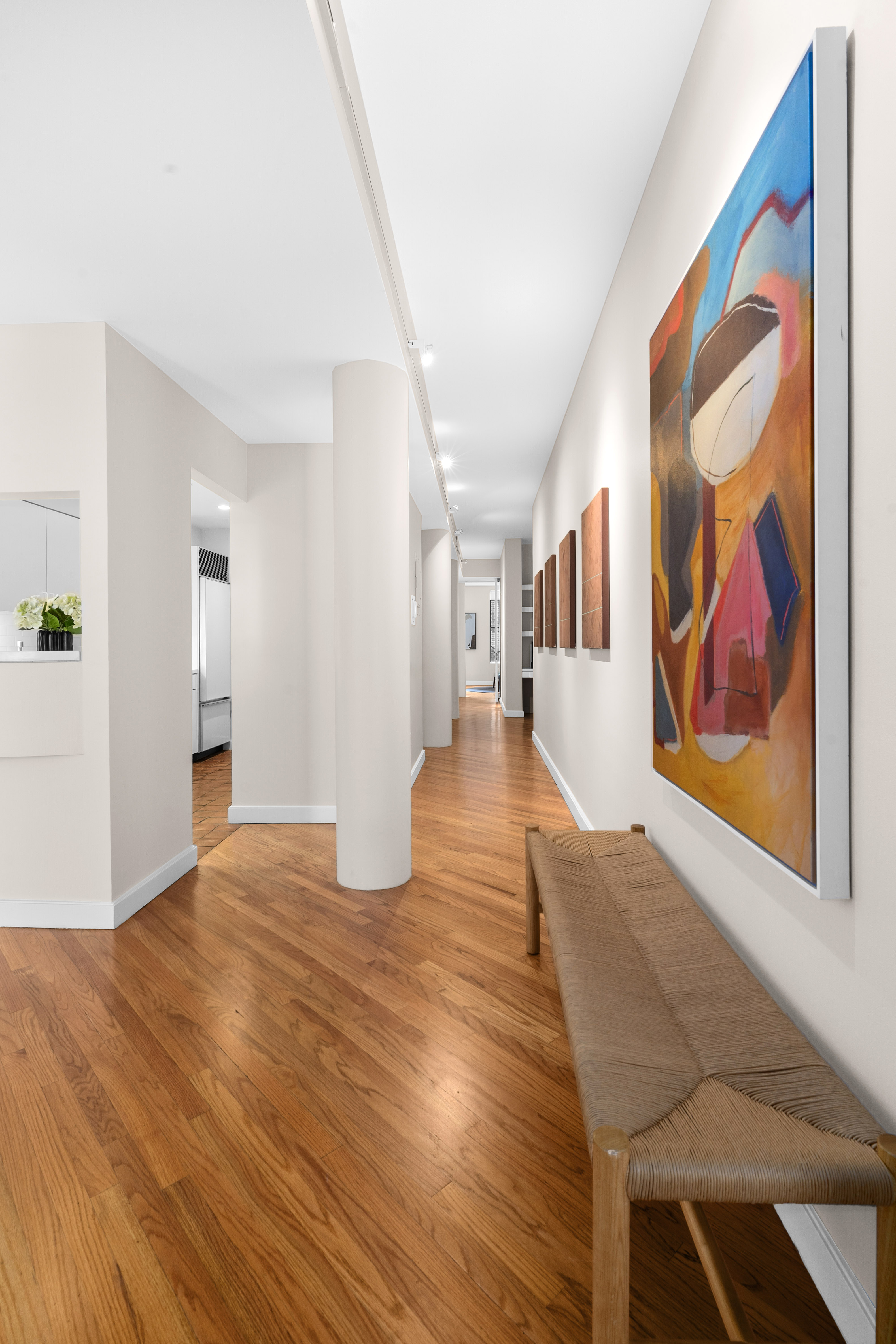 27 East 22nd Street, Unit F4 Manhattan, NY 10010 - Photo 6 of 15 a view of an empty room with wooden floor