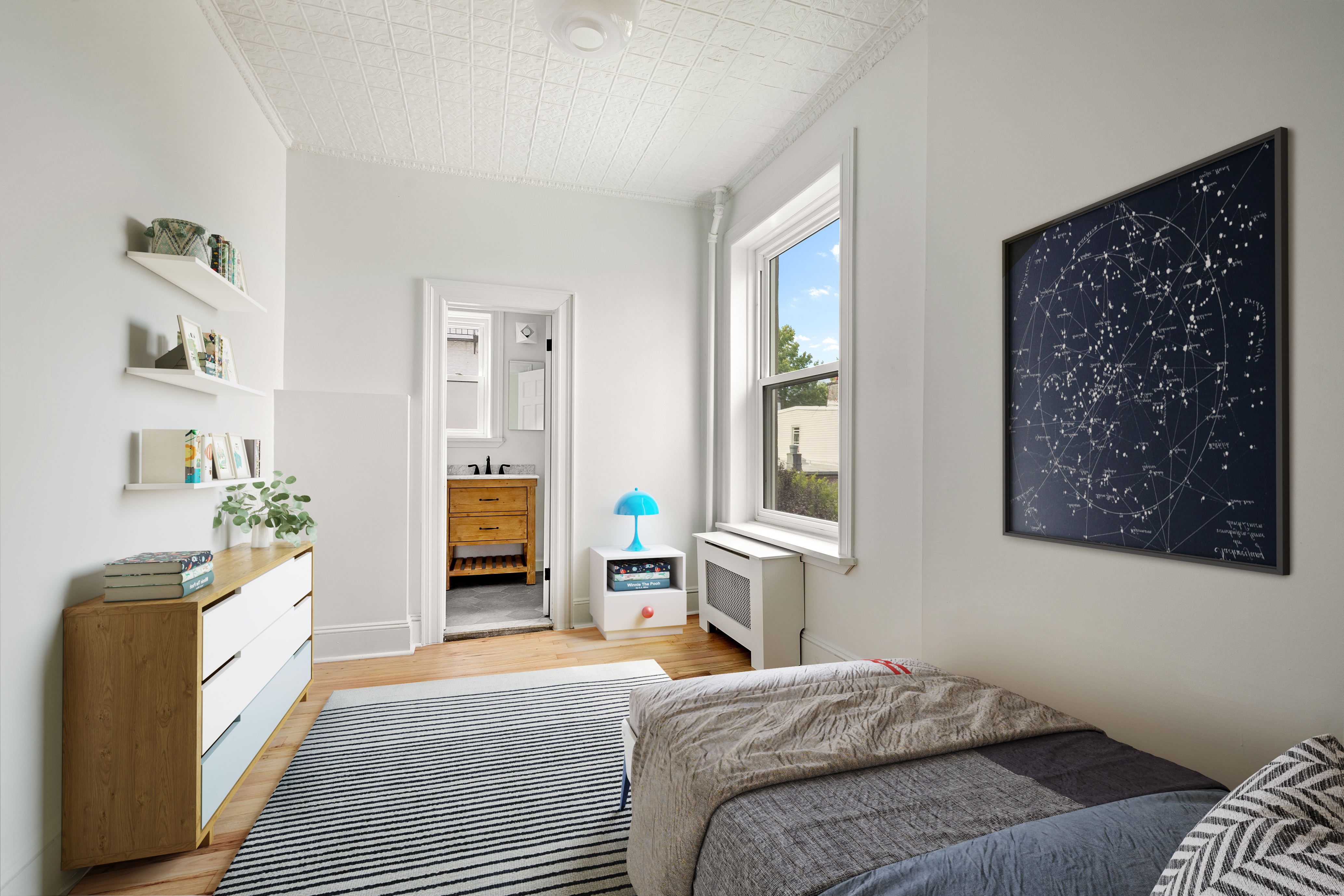 456 Prospect Avenue, Unit 3R Brooklyn, NY 11215 - Photo 11 of 16 a bedroom with a bed and a couch