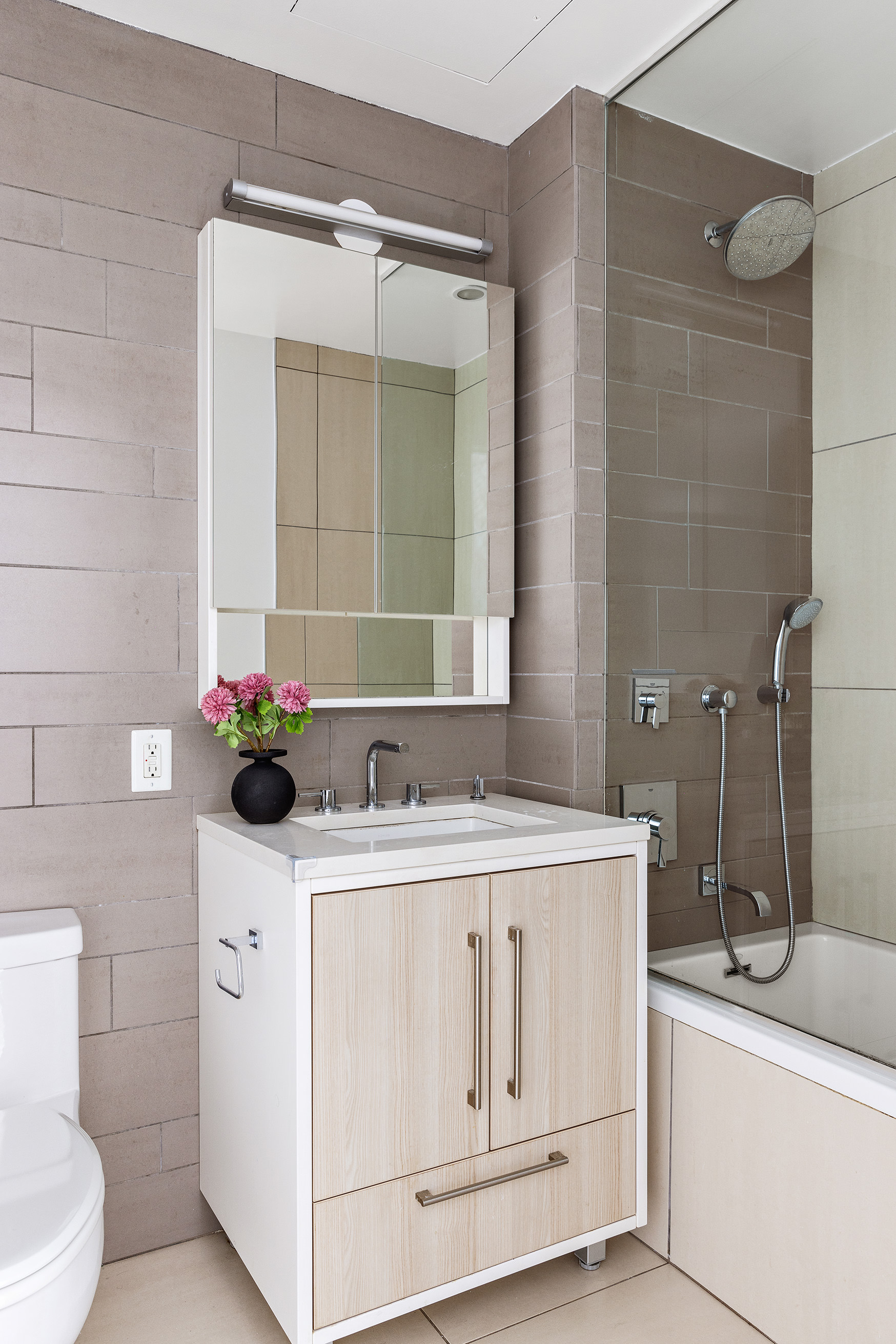 212 North 9th Street, Unit 3C Brooklyn, NY 11211 - Photo 9 of 16 a bathroom with a sink toilet and shower