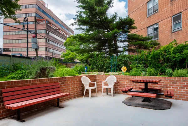 a view of outdoor sitting area with furniture