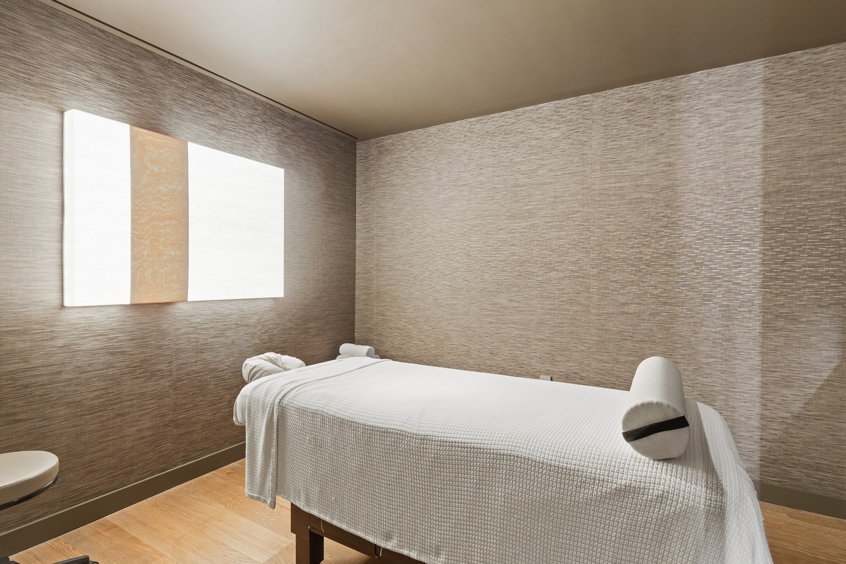 101 Warren Street, Unit 2420 Manhattan, NY 10007 - Photo 22 of 23 a bedroom with a bed and a window