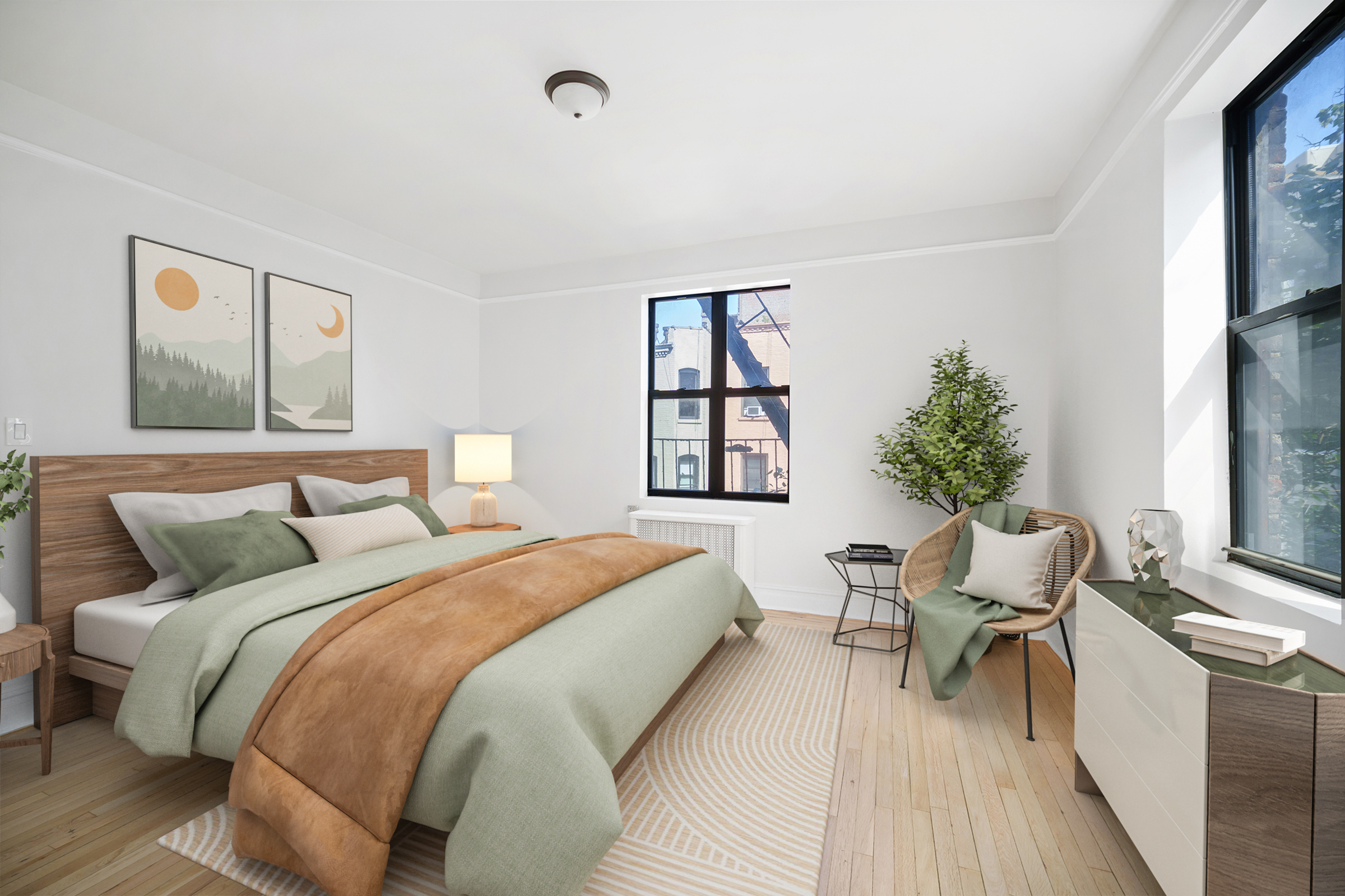 690 Riverside Drive, Unit 3F Manhattan, NY 10031 - Photo 4 of 19 a bedroom with a large bed and a large window