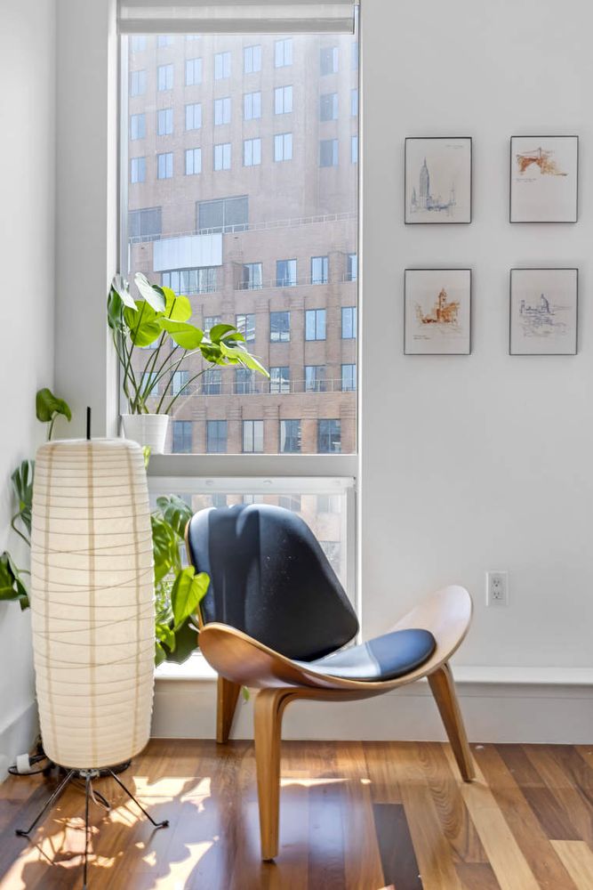 150 Myrtle Avenue, Unit 805 Brooklyn, NY 11201 - Photo 4 of 26 a living room with furniture and a potted plant