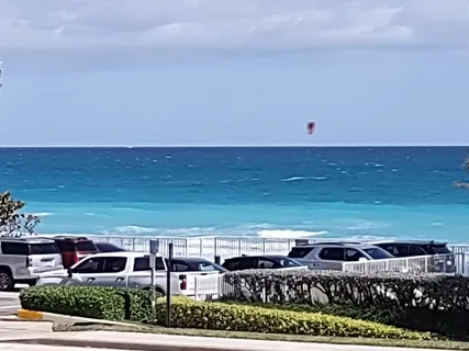 a view of swimming pool from a balcony