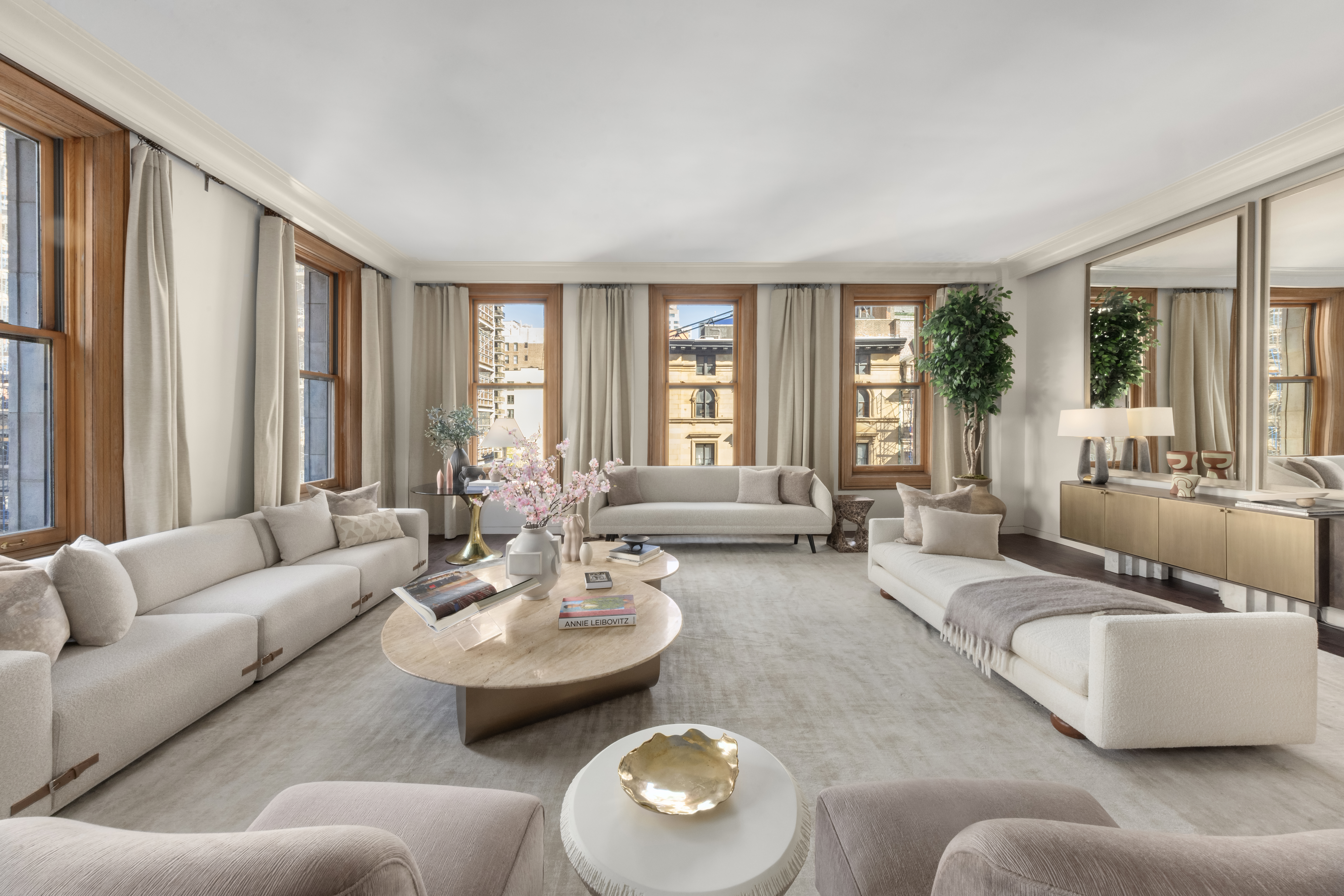 170 5th Avenue, Unit 5 Manhattan, NY 10010 - Photo 2 of 22 a living room with furniture and a large window