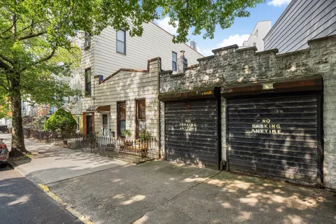 a view of a house with a garage
