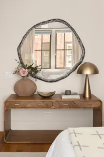 a view of living room with furniture and window