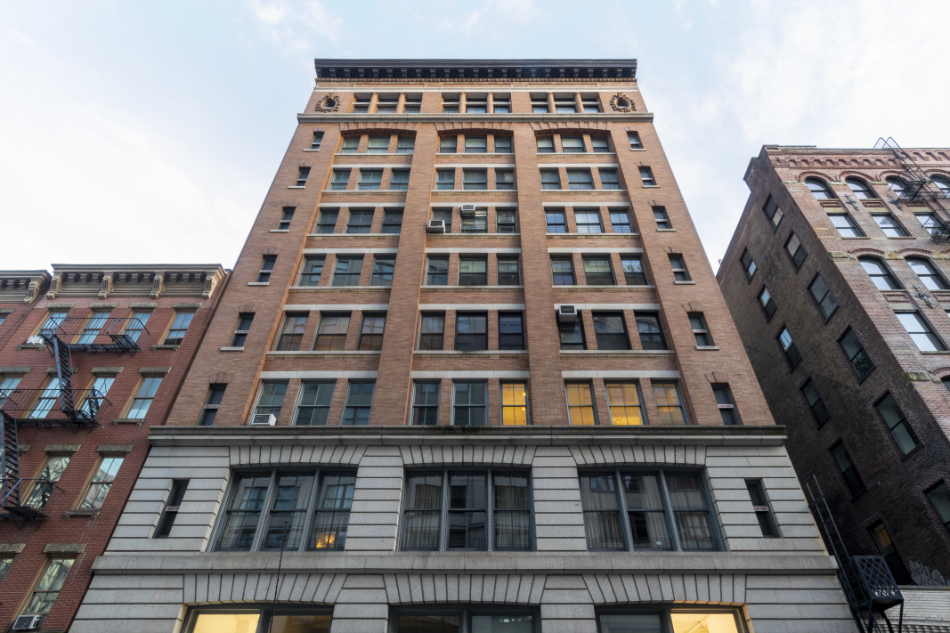 20-26 North Moore Street, Unit 4W Manhattan, NY 10013 - Photo 22 of 24 front view of a building