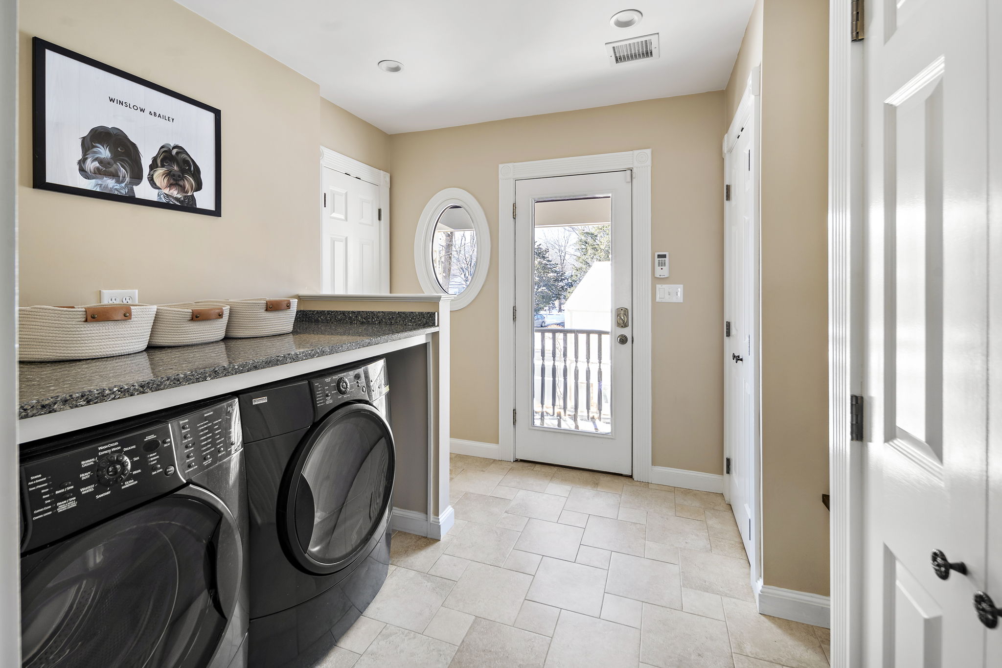 56 Jefferson Road Winchester, MA 01890 - Photo 16 of 26 a view of a livingroom with washer and dryer