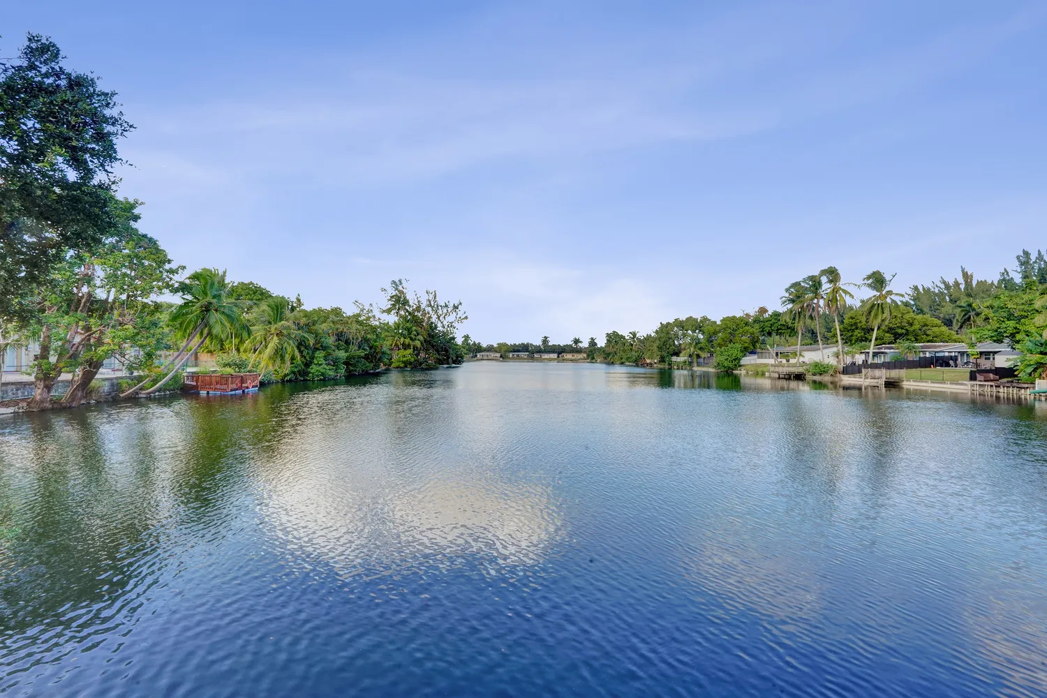 a view of a lake with a building in the background