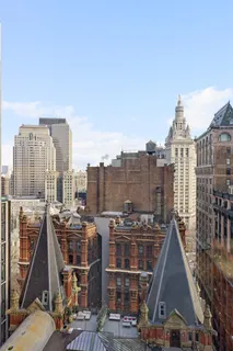 a picture of a bathroom with a sink and a mirror