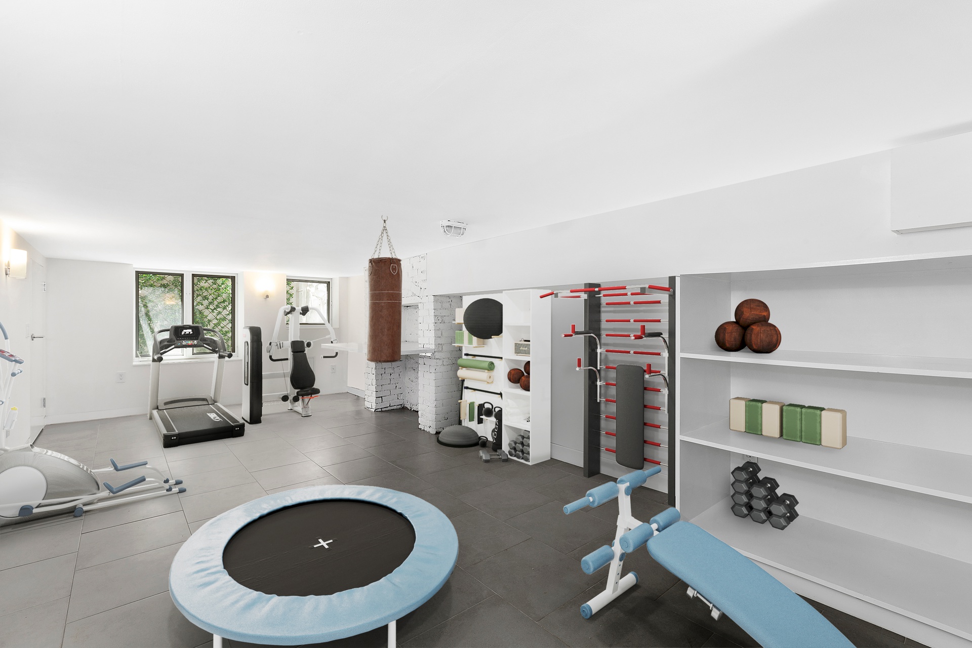 64 Clifton Place, Unit PARLOR Brooklyn, NY 11238 - Photo 15 of 17 a living room with furniture and gym equipment