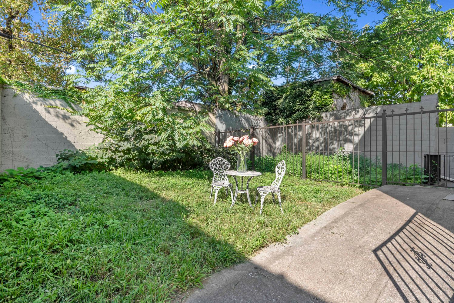 756 Barbey Street, Unit 1A Brooklyn, NY 11207 - Photo 6 of 9 a view of a bench in the garden