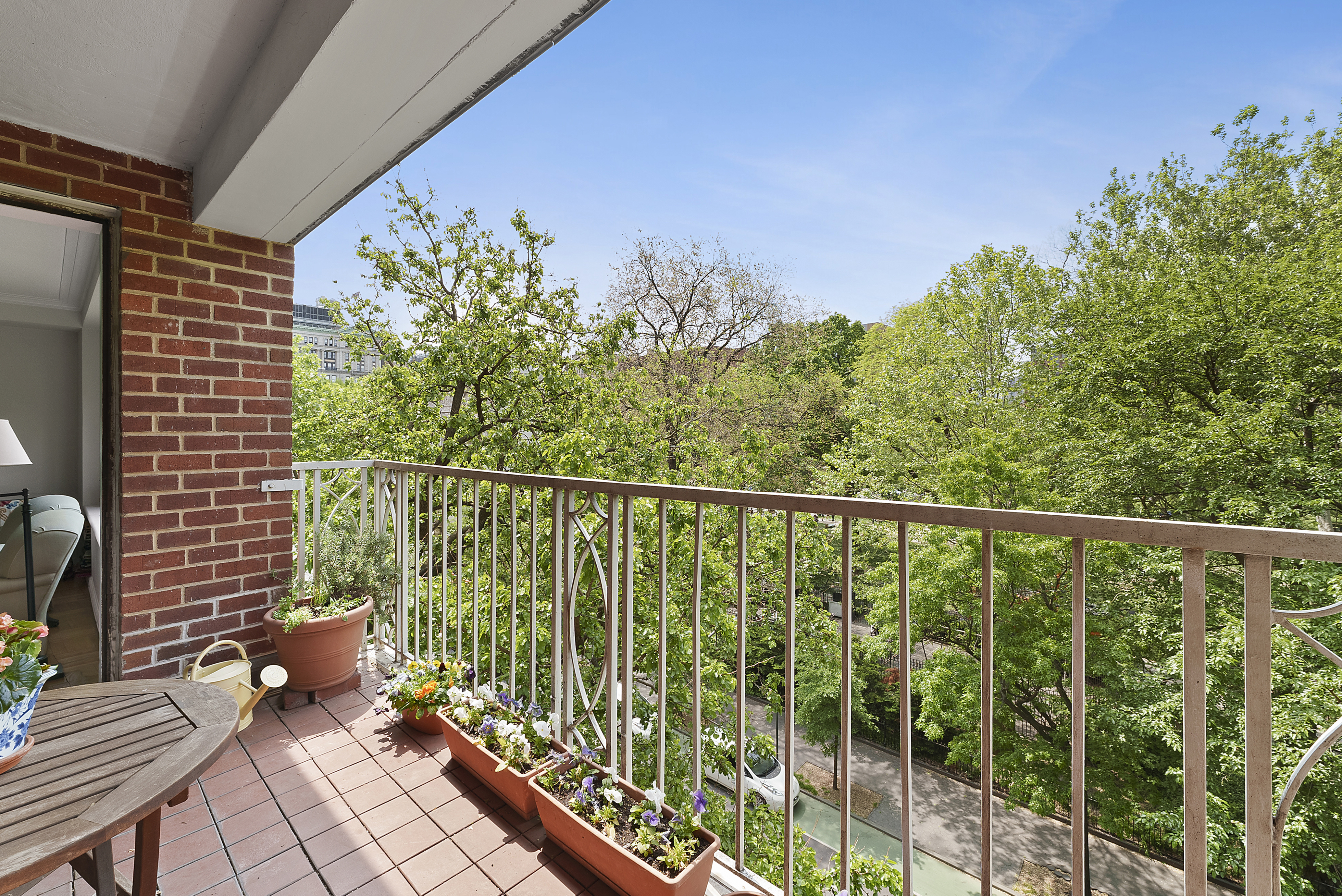 2 5th Avenue, Unit 55 Manhattan, NY 10011 - Photo 8 of 20 a roof deck with wooden fence
