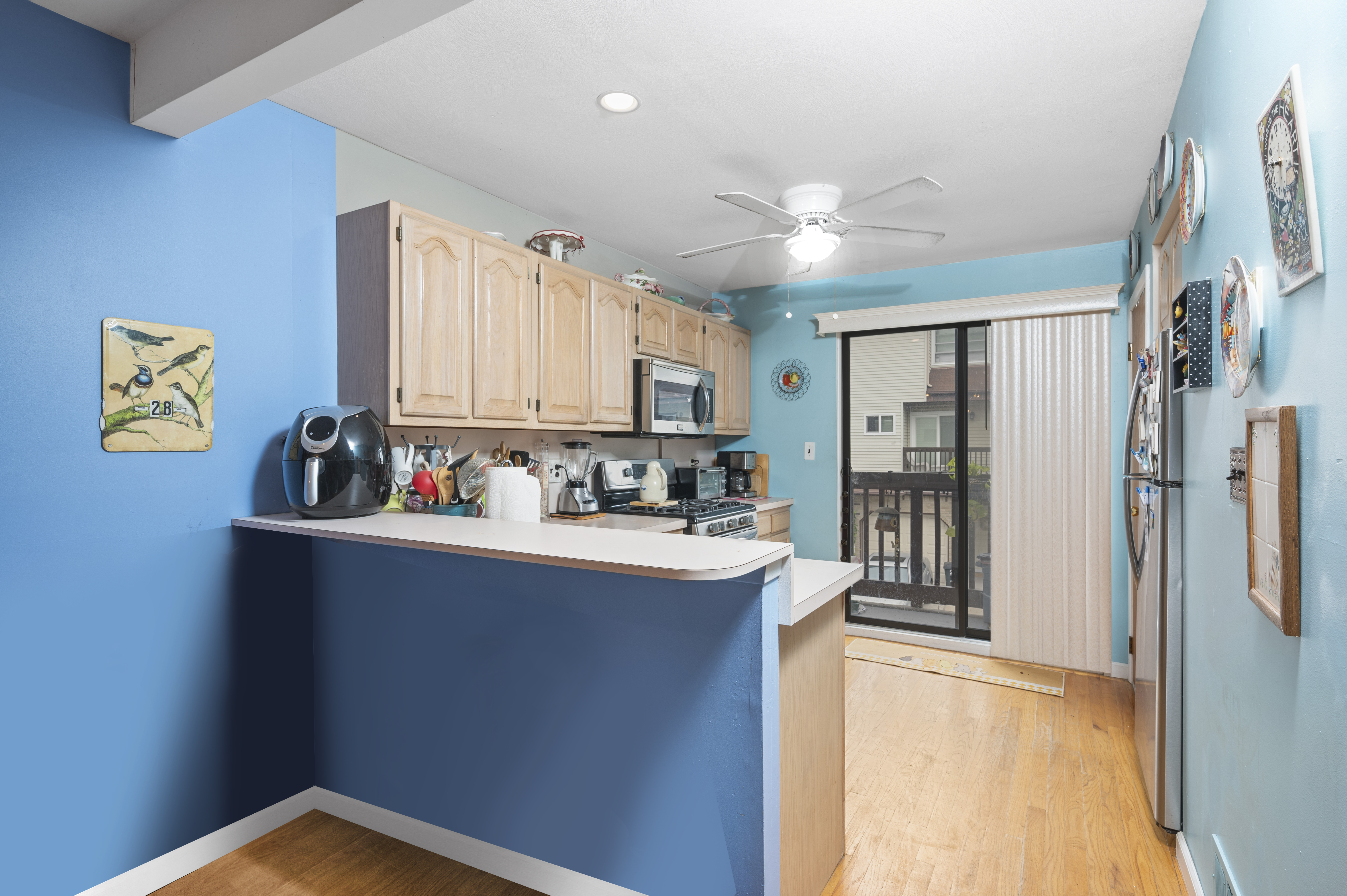 20 Eric Lane Staten Island, NY 10308 - Photo 9 of 20 a kitchen with stainless steel appliances a sink stove and refrigerator