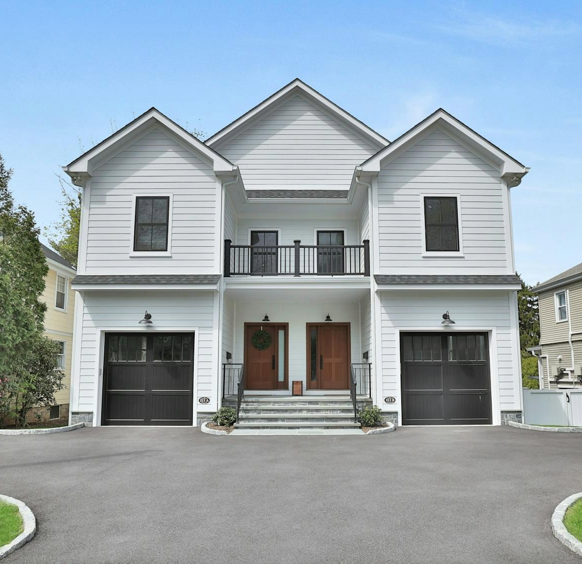 211 Purchase Street, Unit A Rye, NY 10580 - Photo 1 of 22 a front view of a house with yard and parking