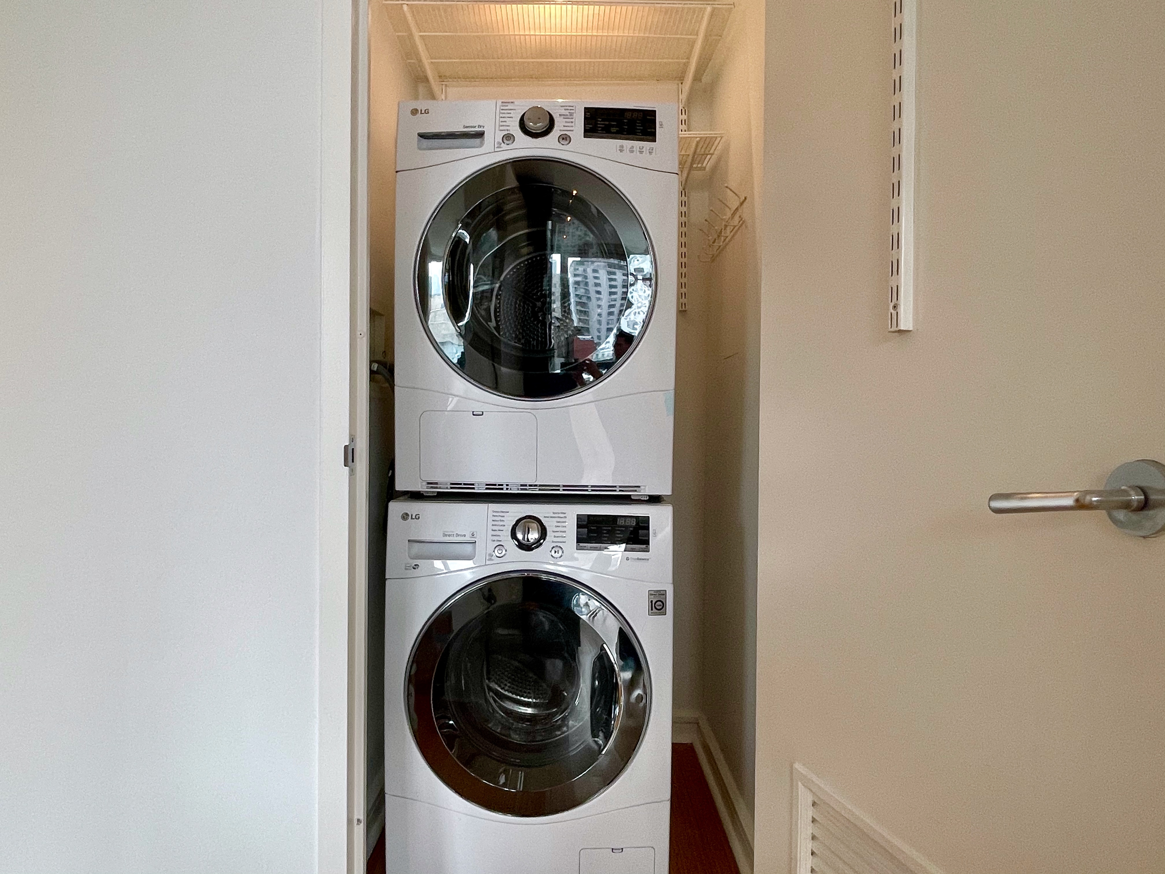 350 West 53rd Street, Unit PHA Manhattan, NY 10019 - Photo 22 of 35 a utility room with dryer and washer
