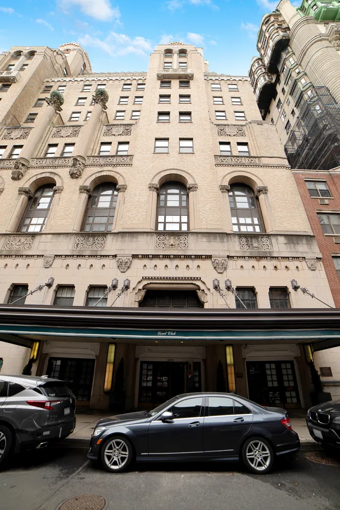 a dining room with a table and chairs