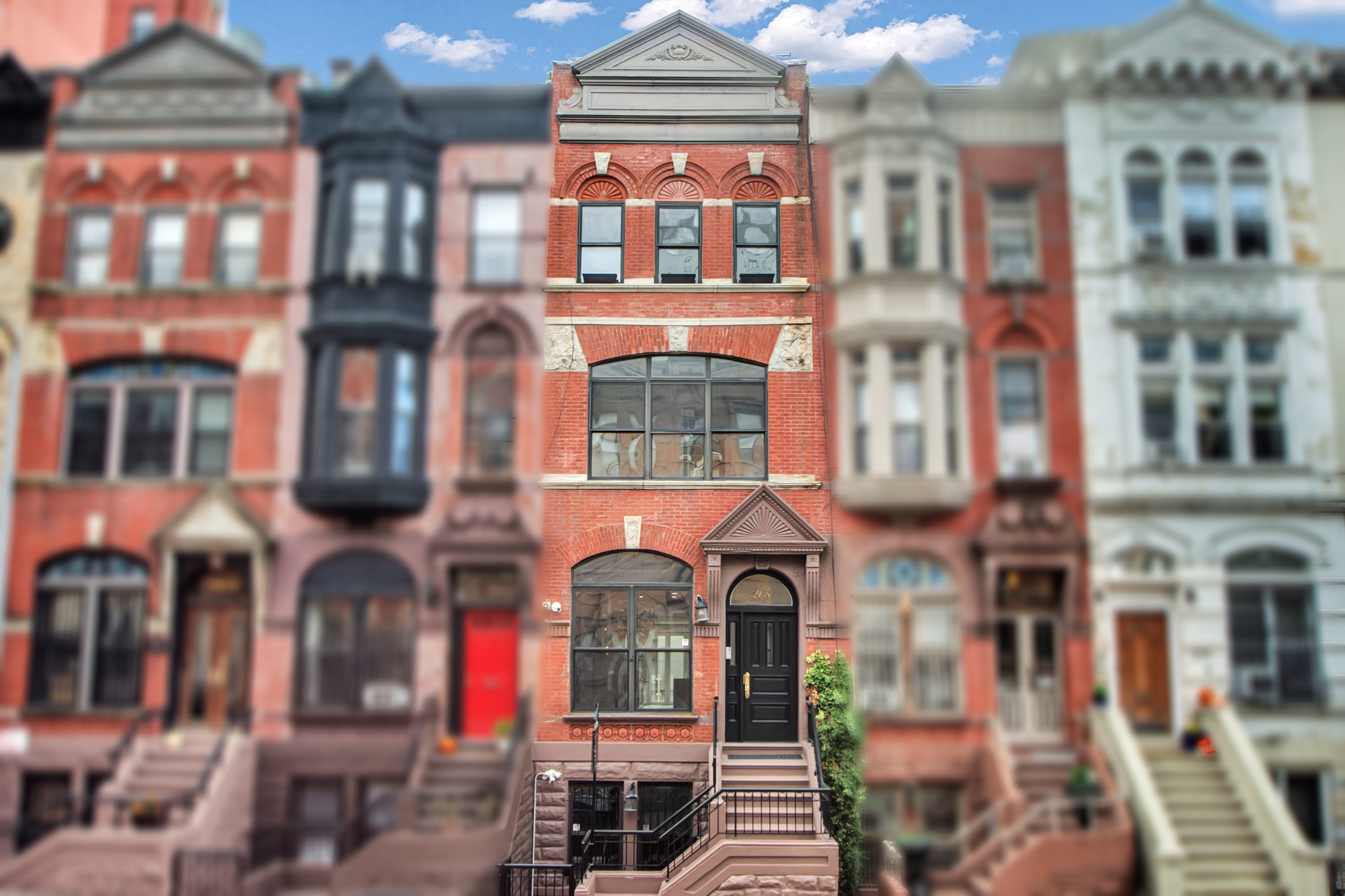 208 West 122nd Street Manhattan, NY 10027 - Photo 21 of 22 a front view of a multi story building