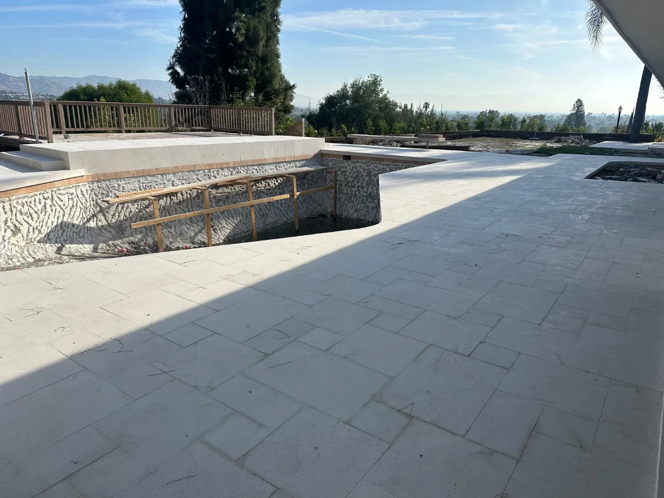 a view of swimming pool with a yard