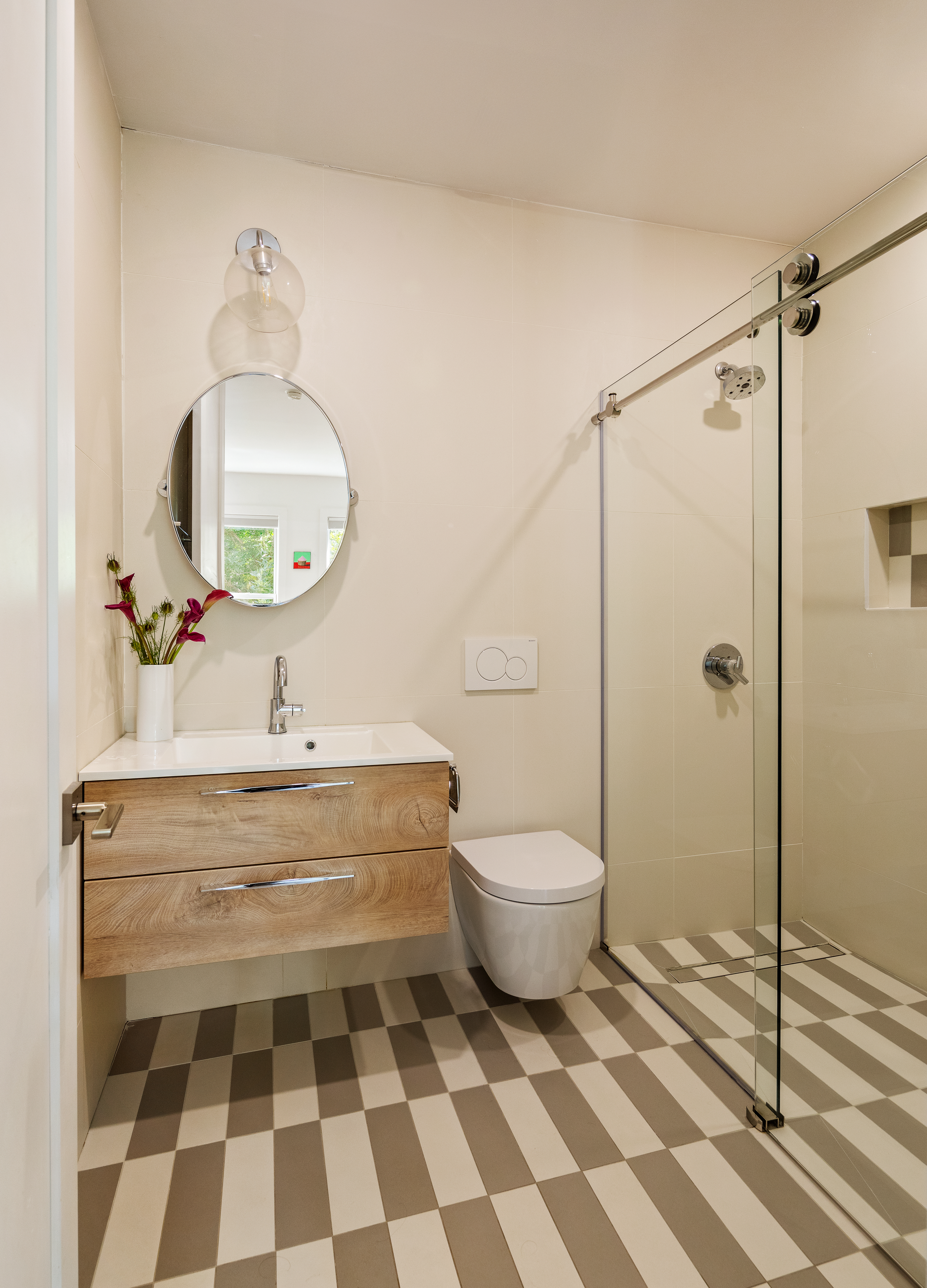 197 Madison Street Brooklyn, NY 11216 - Photo 15 of 19 a bathroom with a sink a toilet and a mirror