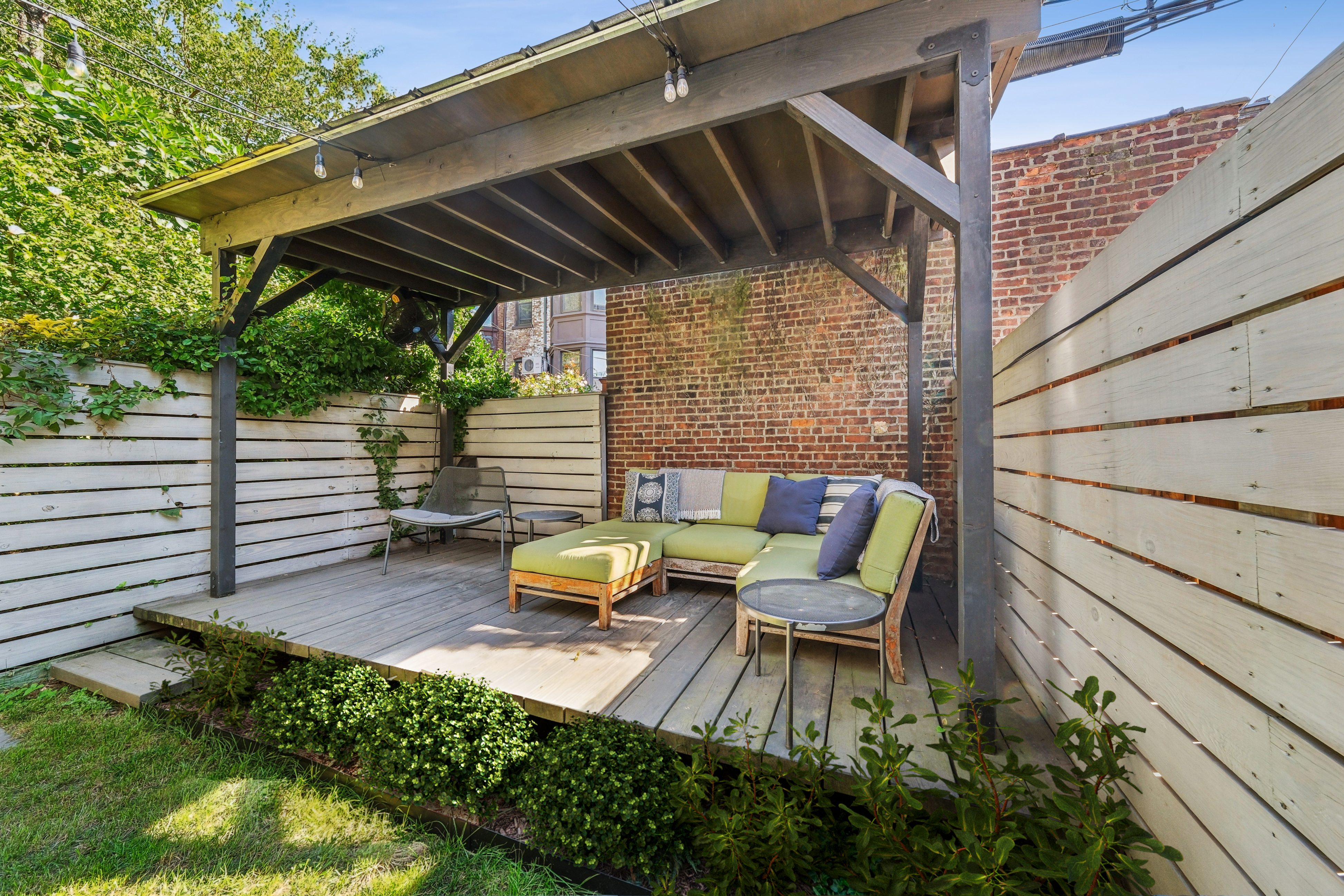 410 Hancock Street Brooklyn, NY 11216 - Photo 20 of 28 a view of backyard with sitting area
