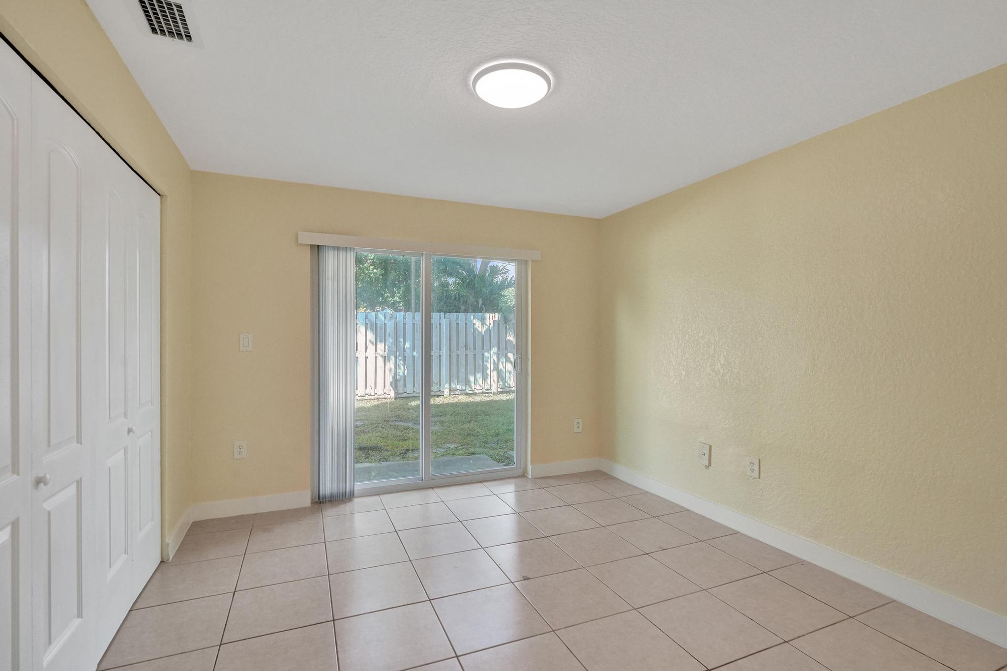 1101 Prospect Road Fort Lauderdale, FL 33309 - Photo 13 of 34 a view of an empty room and window