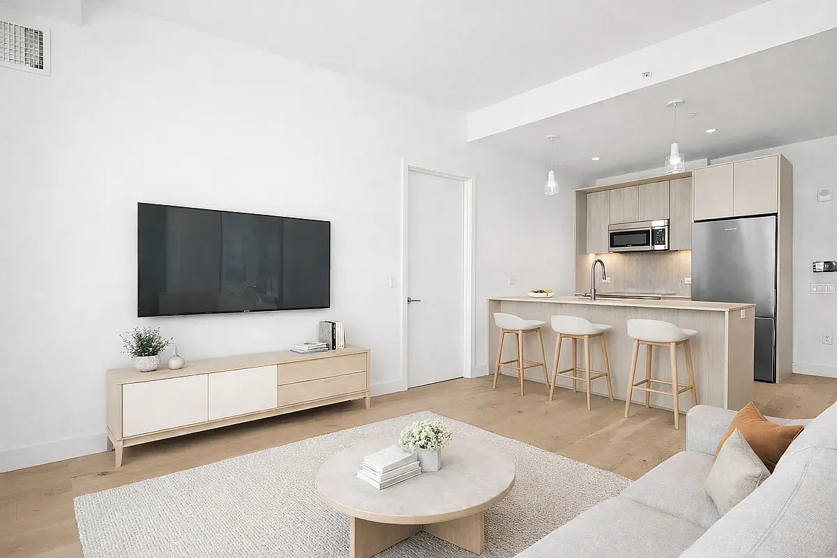 130 2nd Street, Unit 9B Brooklyn, NY 11231 - Photo 2 of 19 a living room with furniture and a view of kitchen