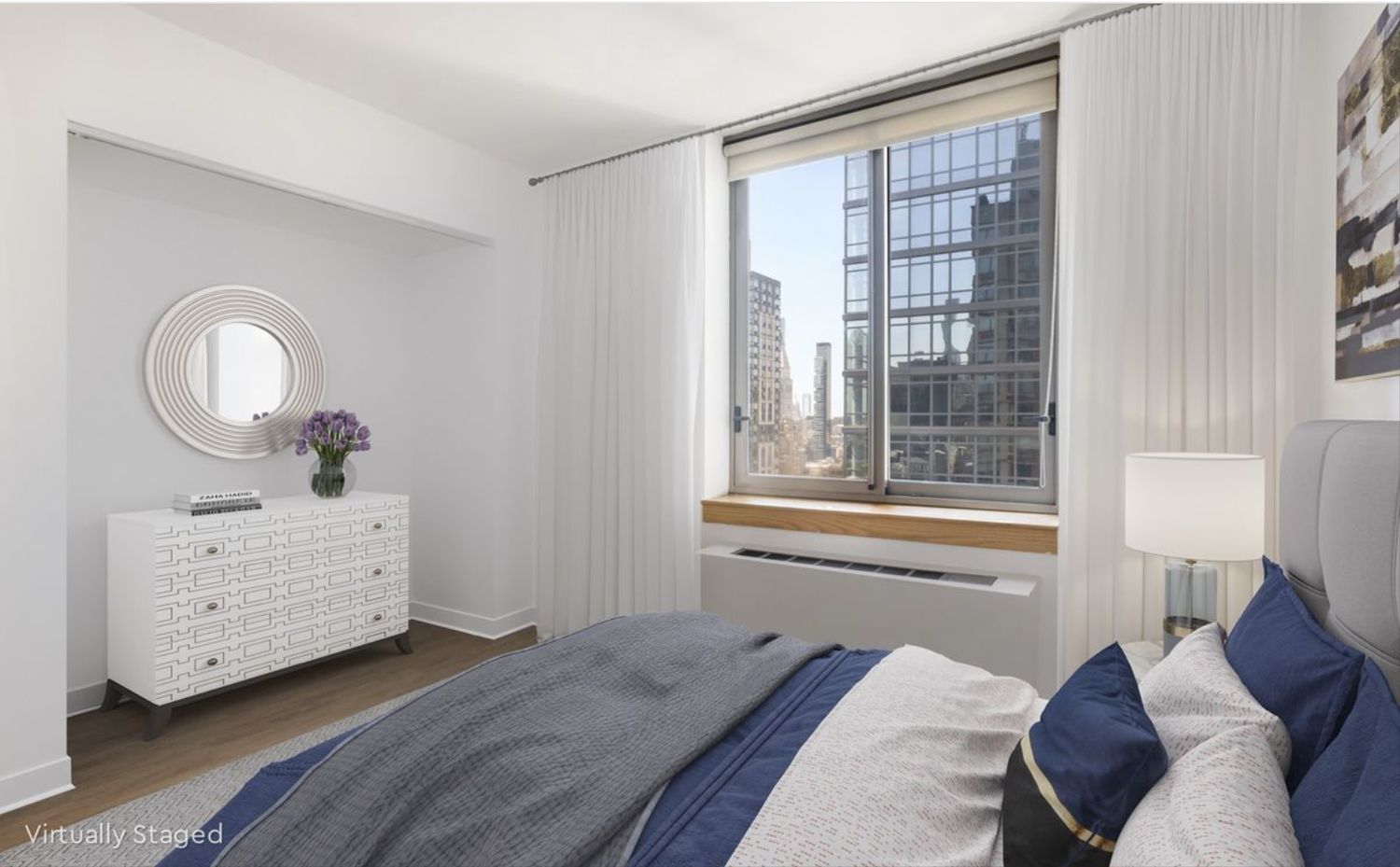 35 West 33rd Street, Unit 28D Manhattan, NY 10001 - Photo 3 of 28 a bedroom with a bed and a dresser