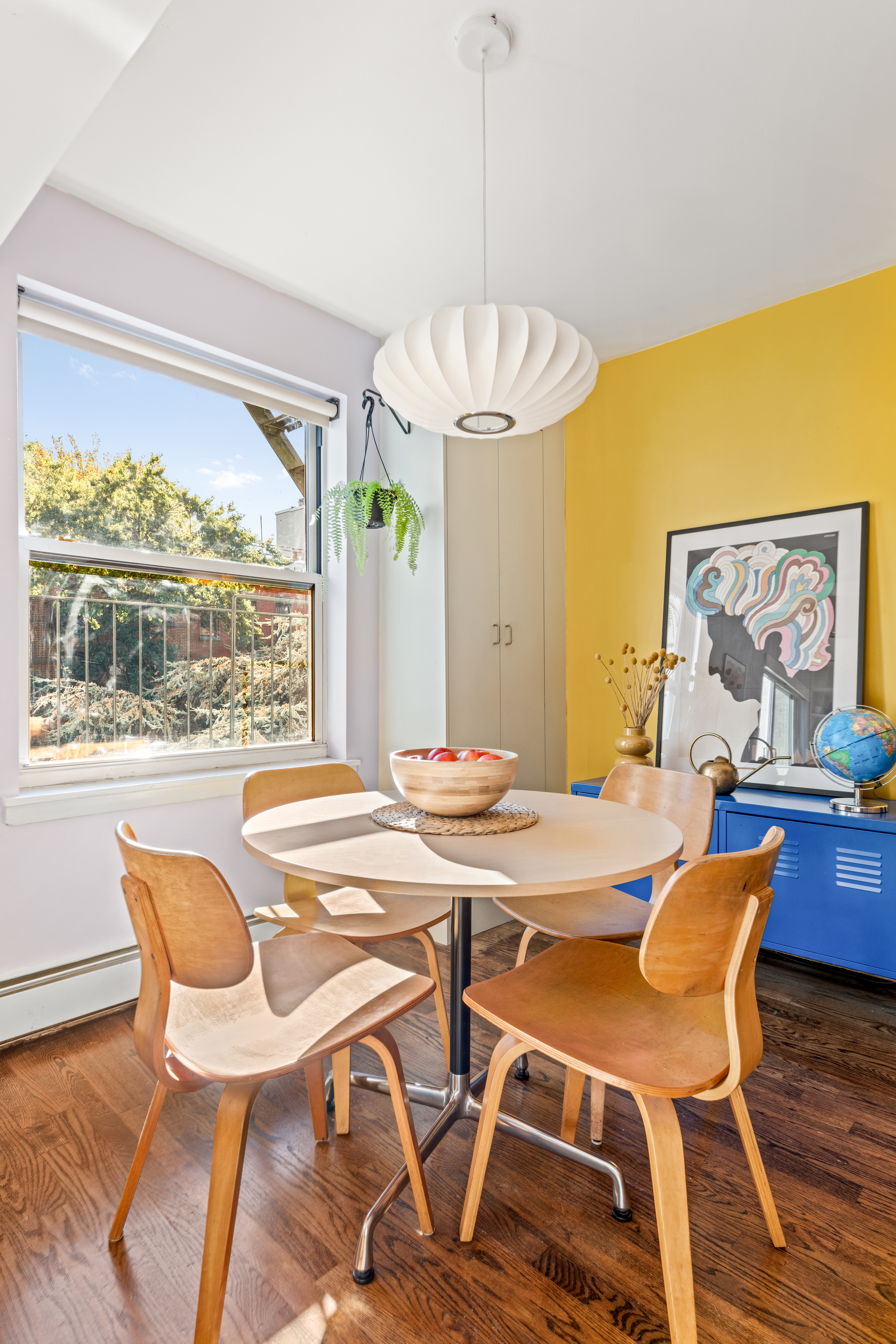 95 Wyckoff Street, Unit 2D Brooklyn, NY 11201 - Photo 4 of 13 a view of a dining room with furniture wooden floor and a chandelier