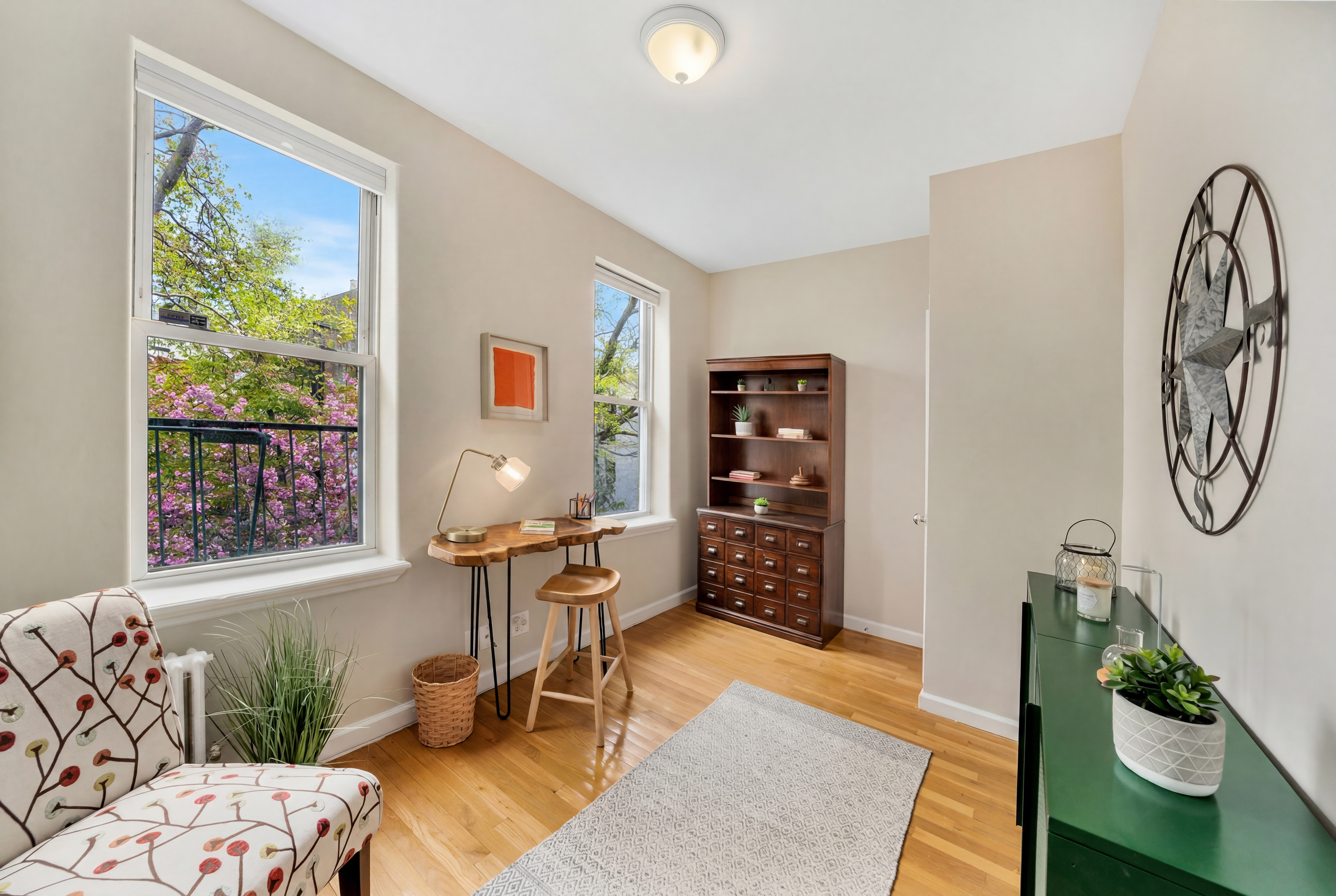 1286 Halsey Street, Unit 3B Brooklyn, NY 11237 - Photo 3 of 10 a living room with furniture and a window