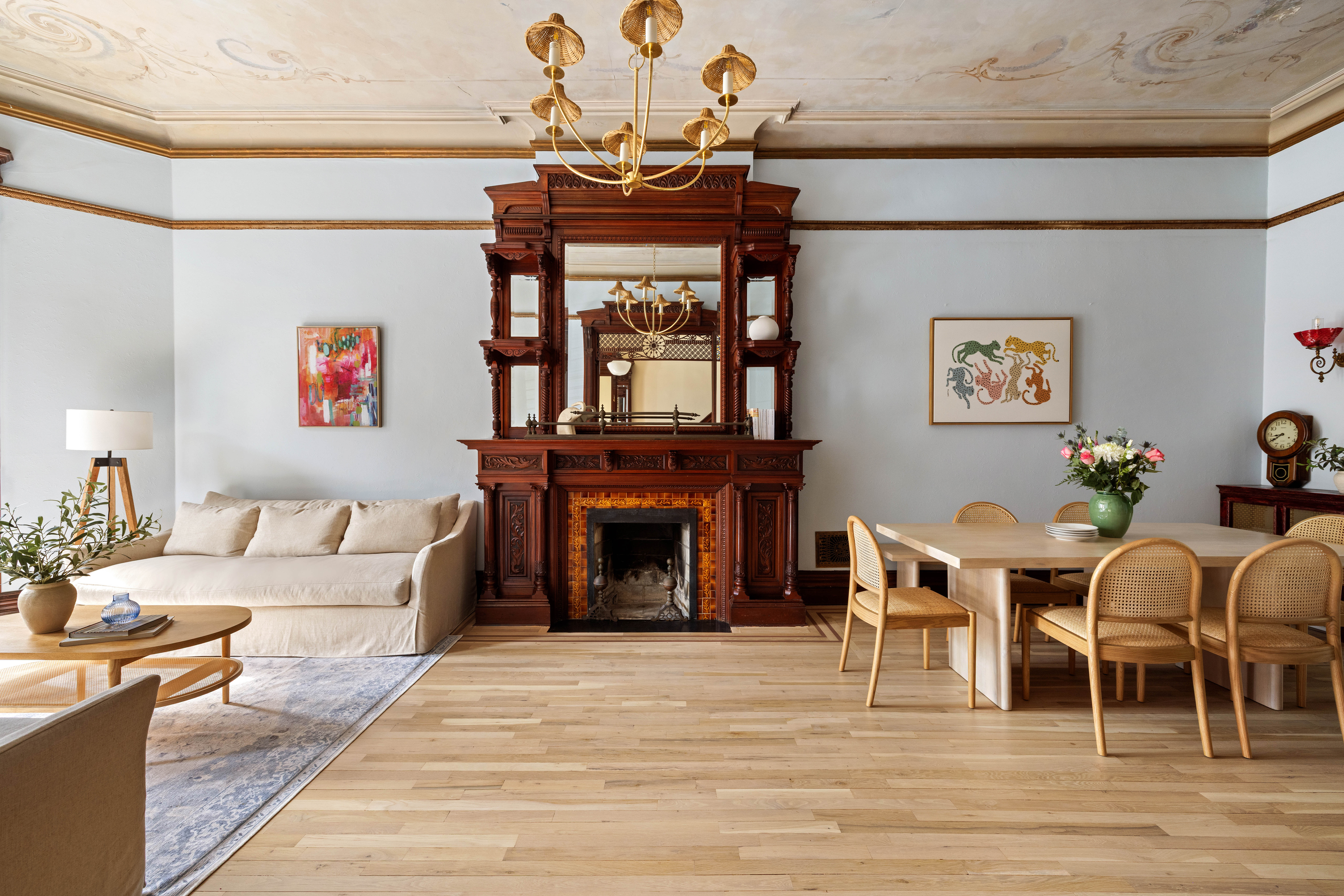 787 Carroll Street Brooklyn, NY 11215 - Photo 1 of 32 a living room with furniture a fireplace and a dining table with wooden floor