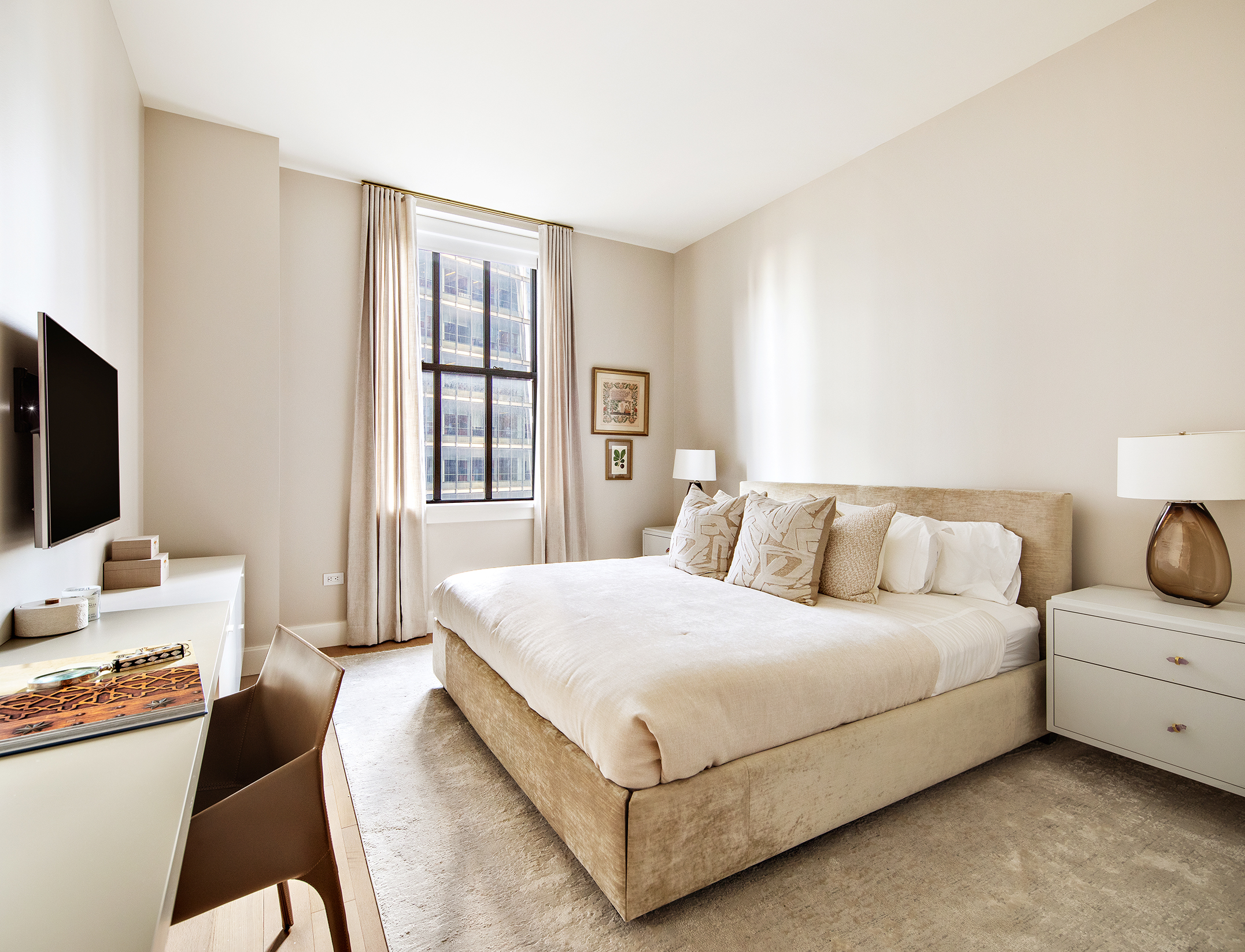 100 Barclay Street, Unit 20D Manhattan, NY 10007 - Photo 14 of 32 a bedroom with a bed and a flat screen tv