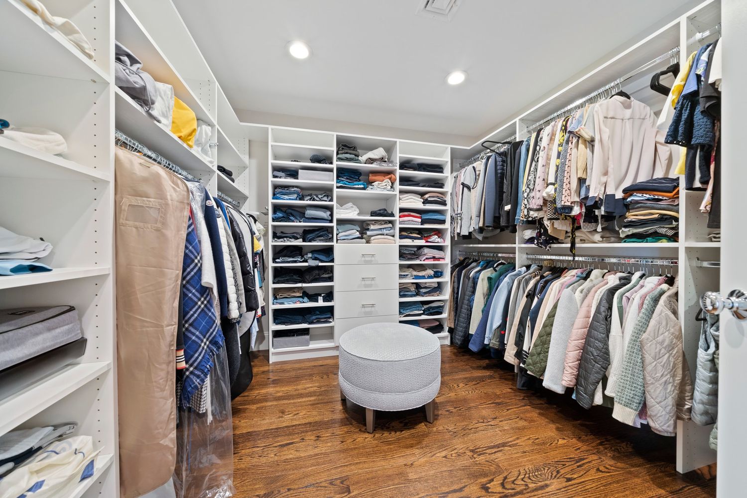 an aerial view of a house with a yard and garden