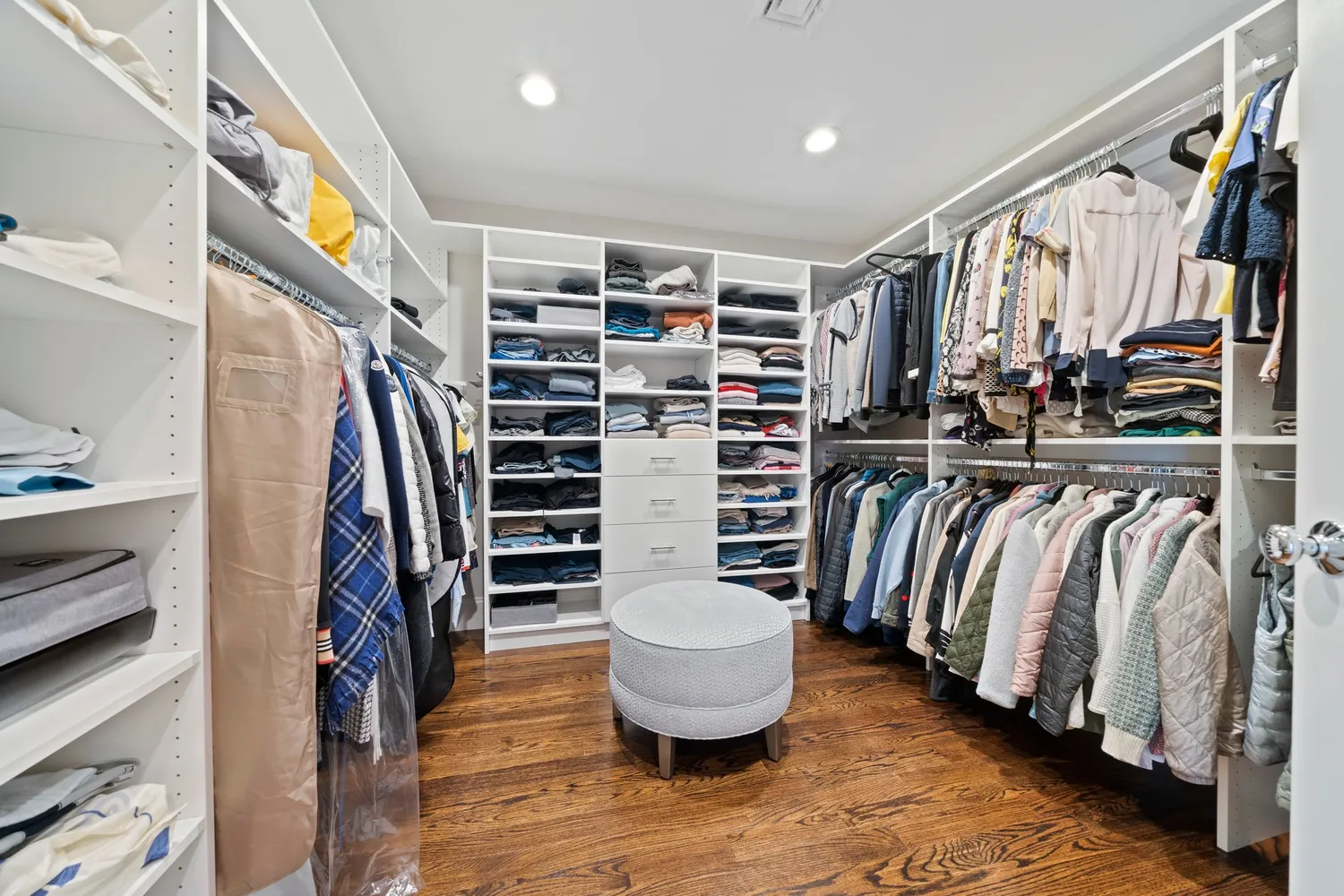 an aerial view of a house with a yard and garden