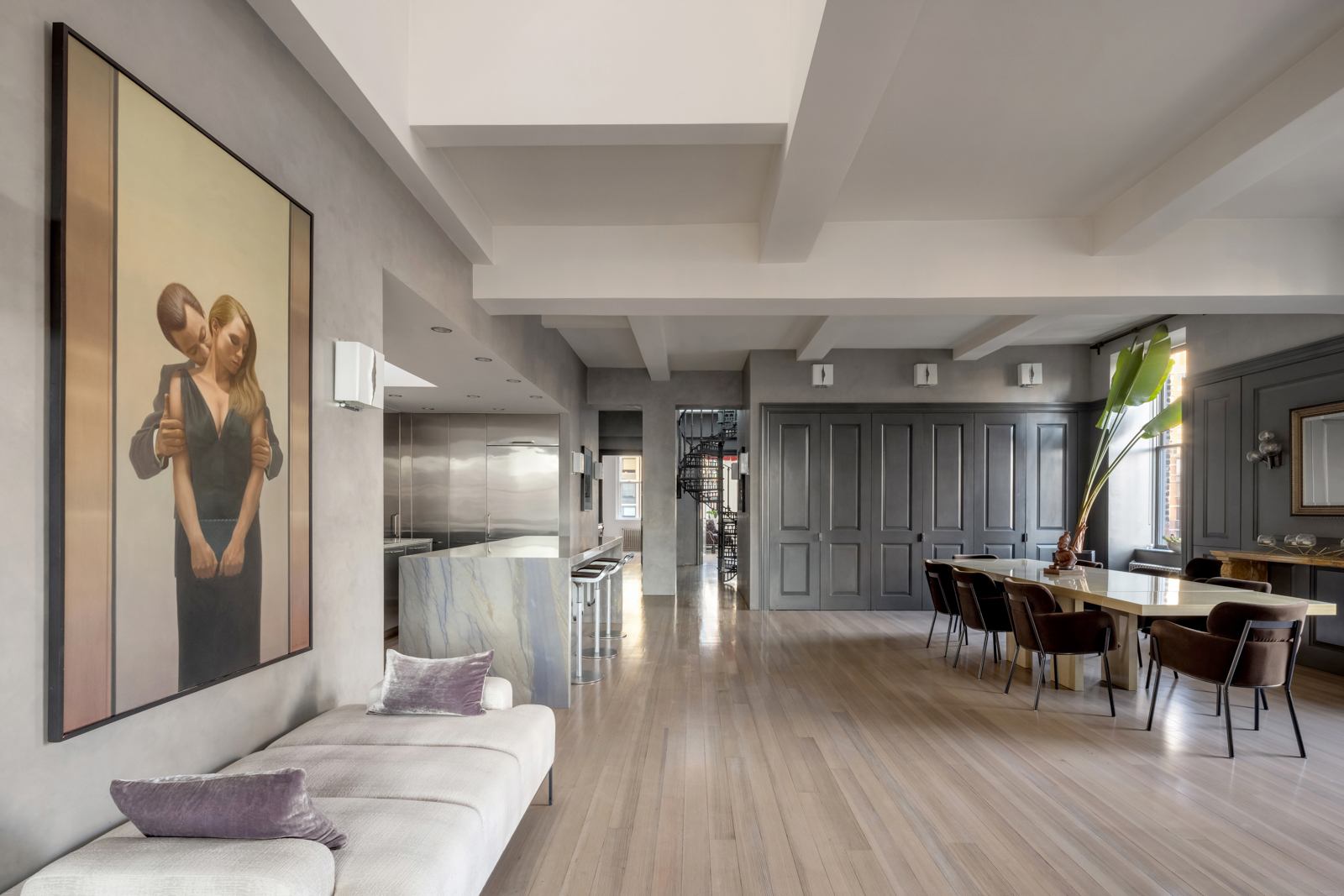 105 East 29th Street, Unit 12PH Manhattan, NY 10016 - Photo 6 of 24 a living room with furniture and a wooden floor