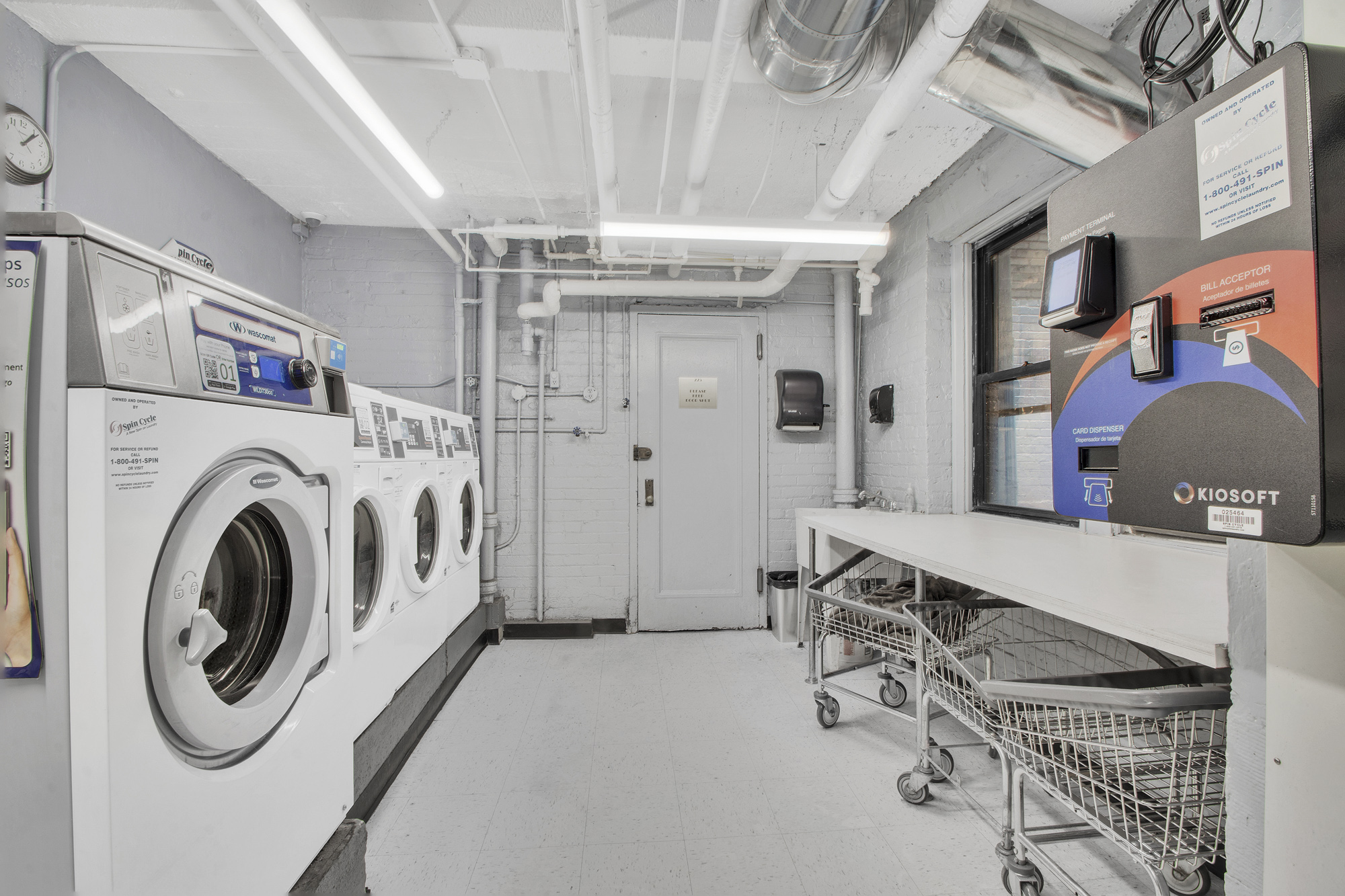 225 West 25th Street, Unit 5K Manhattan, NY 10001 - Photo 15 of 17 a utility room with dryer and washer