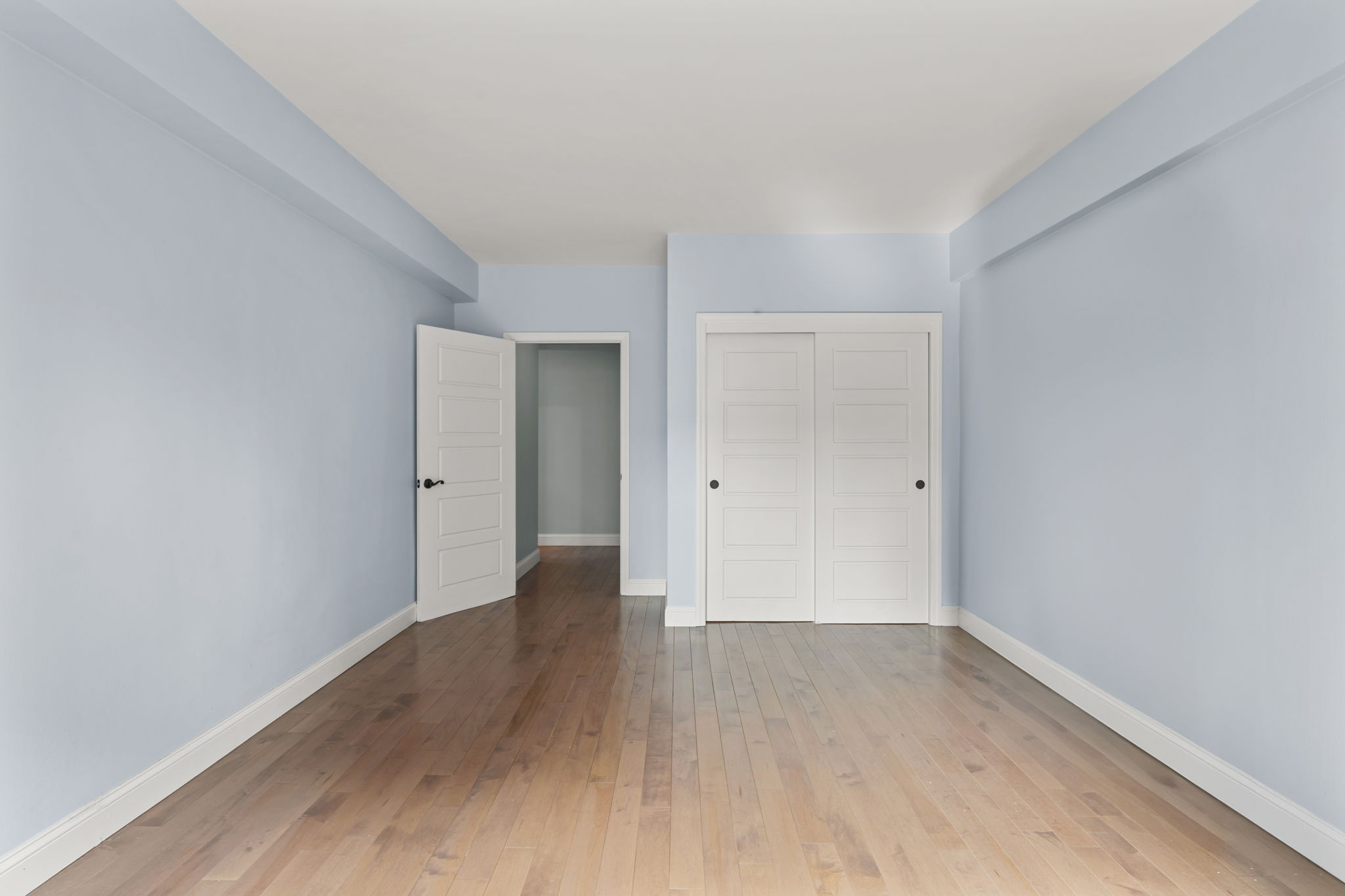 2 Tudor City Place, Unit 6JOS Manhattan, NY 10017 - Photo 14 of 16 a view of an empty room with wooden floor